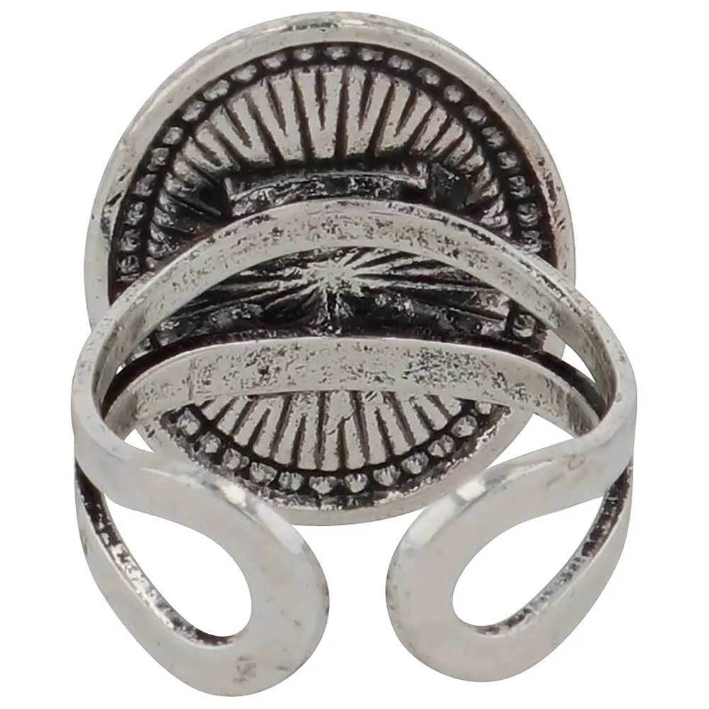 Silver ring with intricate design on a white background