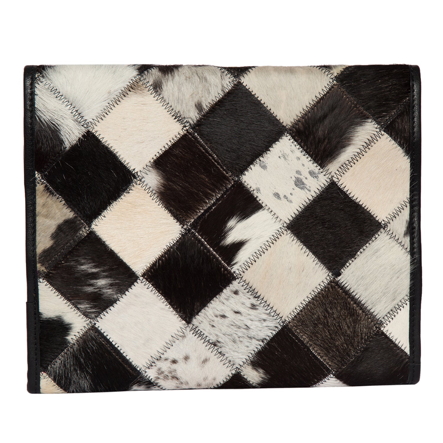 Women's Patchwork Cowhide and Tooling Leather Makeup Bag. Checkered patterned rug with black, white, and brown fur squares on a white background
