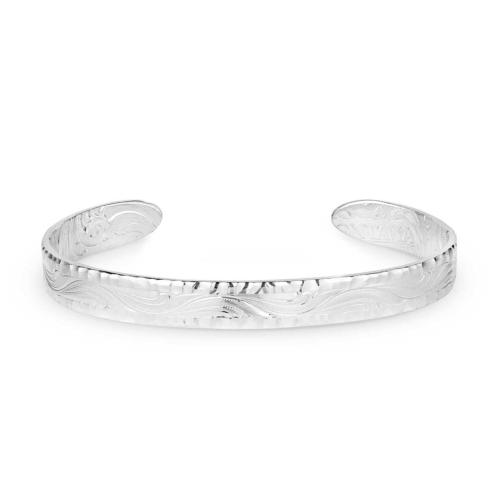 Montana Silversmiths Timeless Elegance Chiseled Cuff Bracelet. A silver cuff bracelet with detailed etching and a chiseled edge.