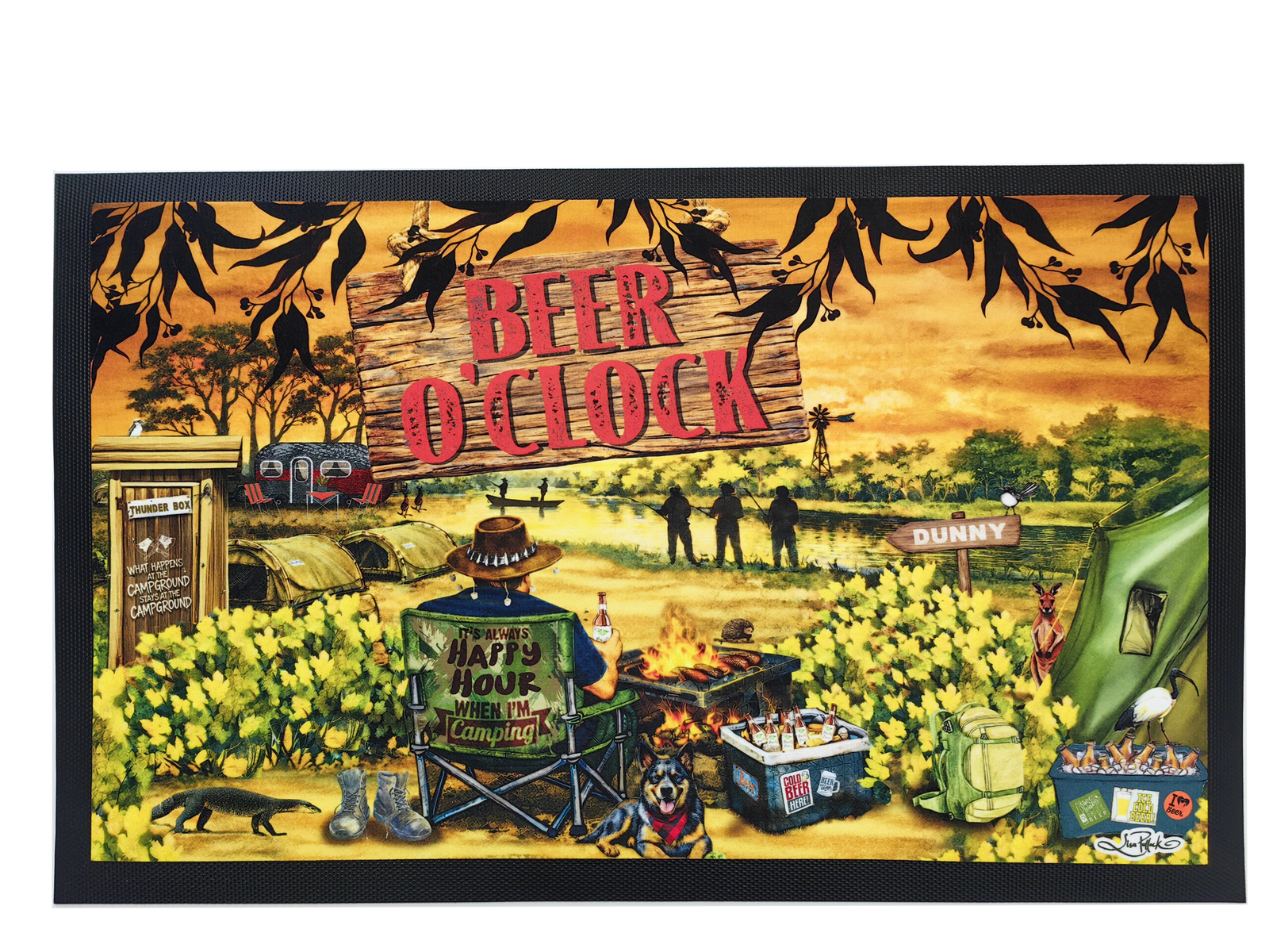 A rectangular printed mat or rug with a black border, featuring a colorful illustrated campsite scene under a wooden sign reading 'BEER O'CLOCK.' The artwork includes a campfire, tents, flowers, a green trailer, people silhouettes, and small decorative signs.