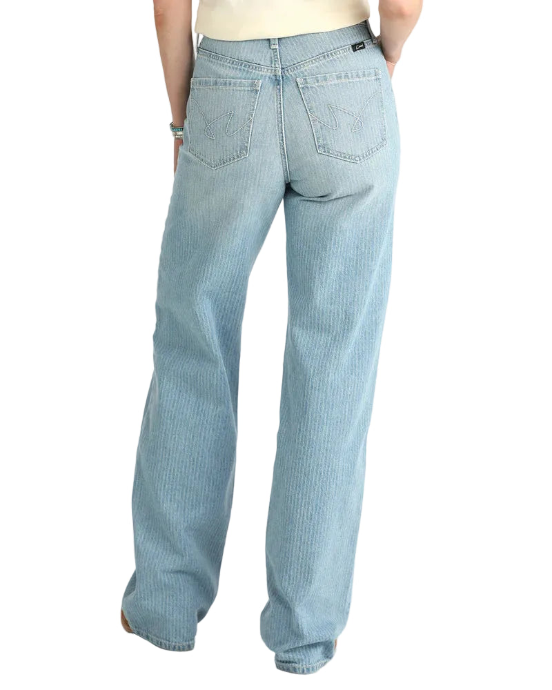 Light blue jeans worn by a person on a white background