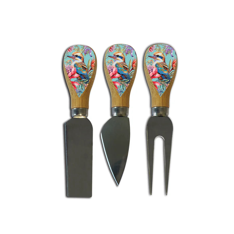 Lisa Pollock Vintage Kookas Knife Block. Set of three cheese tools with floral bird designs on wooden handles against a white background