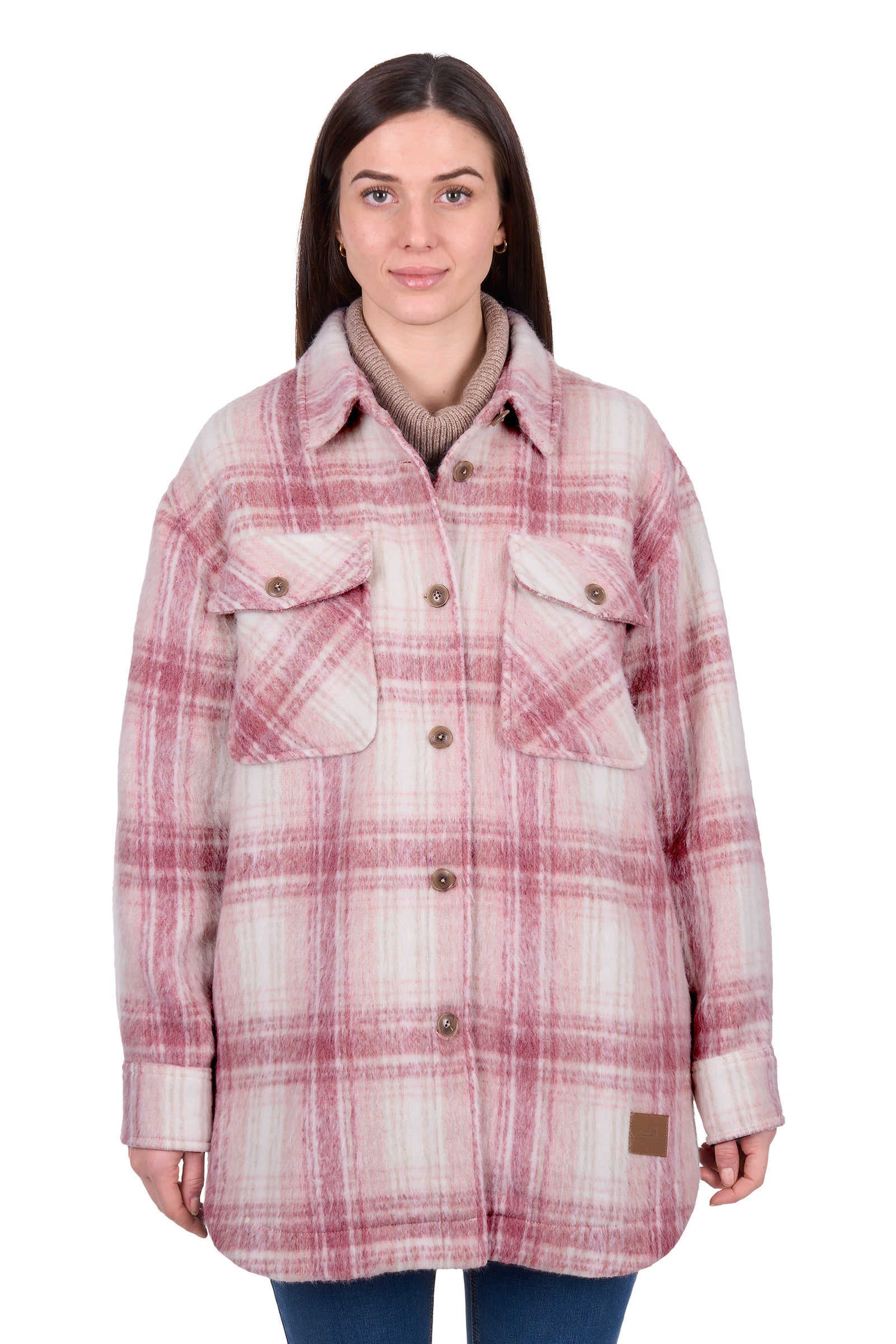 Woman wearing a plaid jacket on a white background