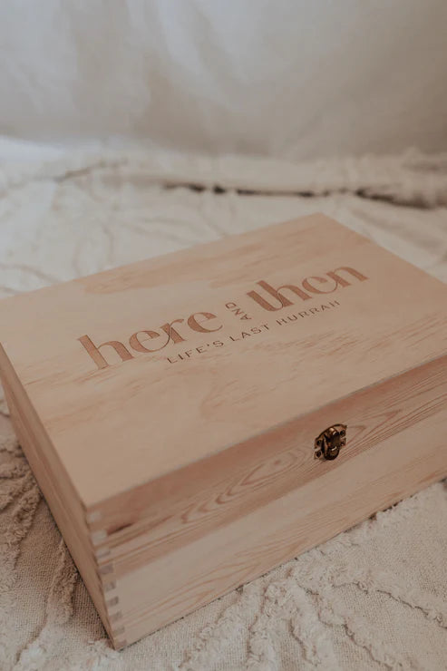 Here And Then Box - Natural. Wooden box with engraved text on a textured surface