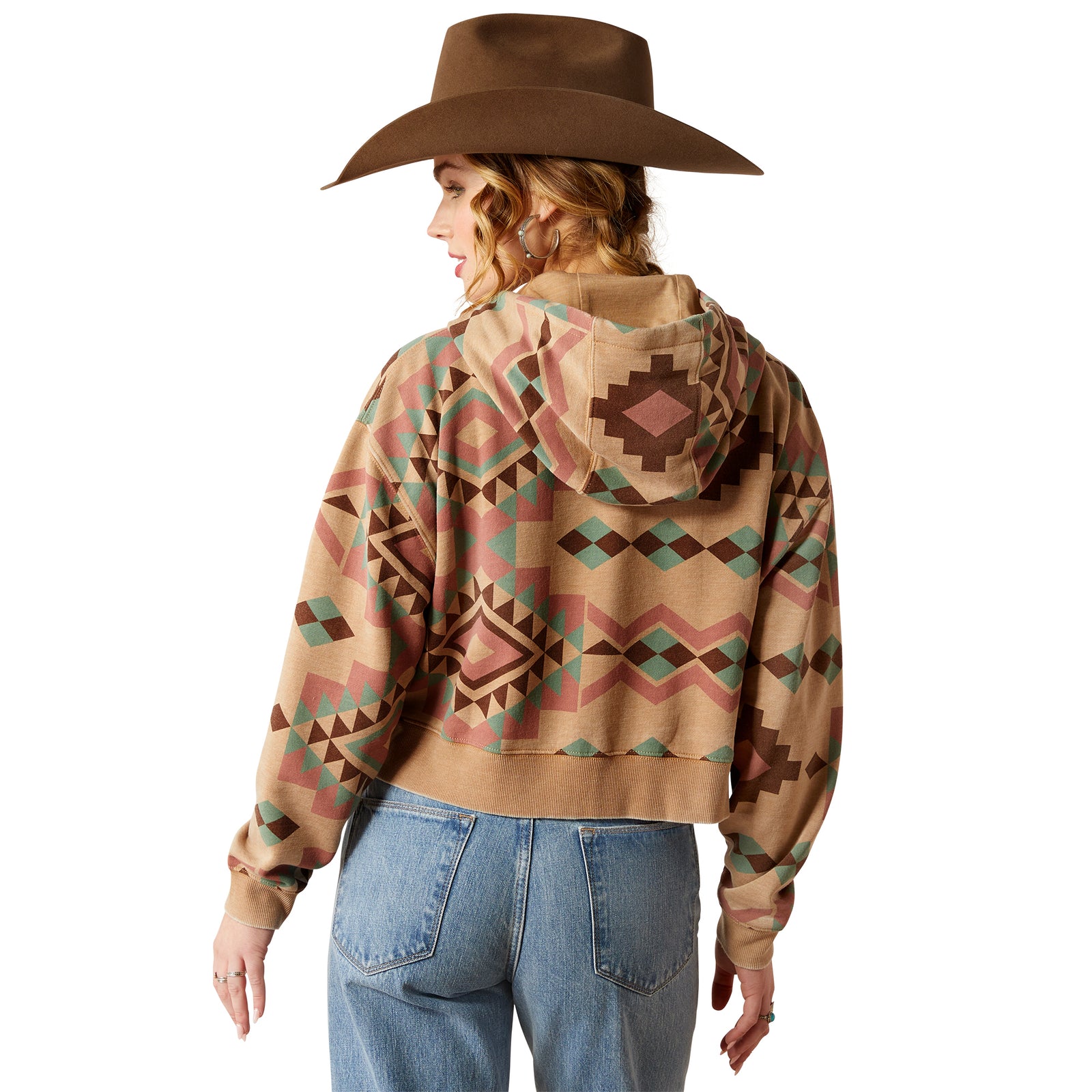 Ariat Women's Sunset Spark Crop Hoodie. Person wearing a patterned hoodie and cowboy hat on a white background