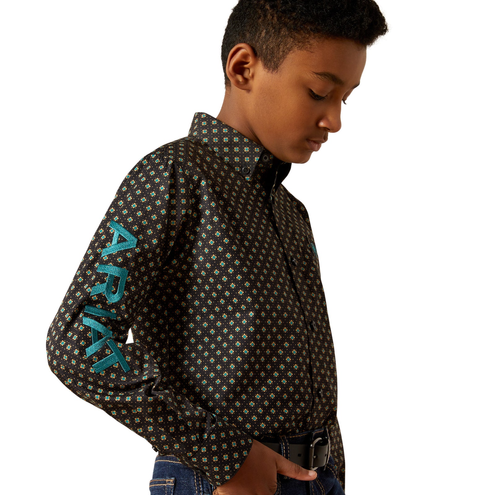 Person wearing a patterned shirt with 'Ariat' branding on a white background