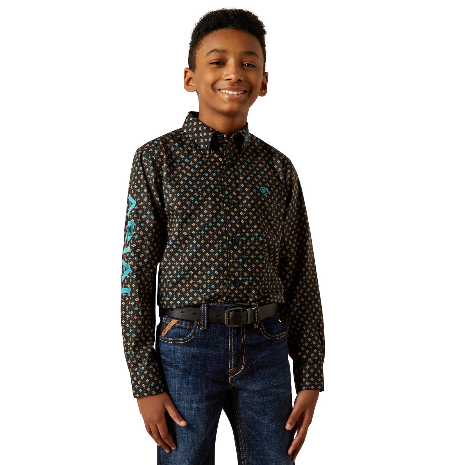Child wearing a patterned shirt with teal accents on a white background