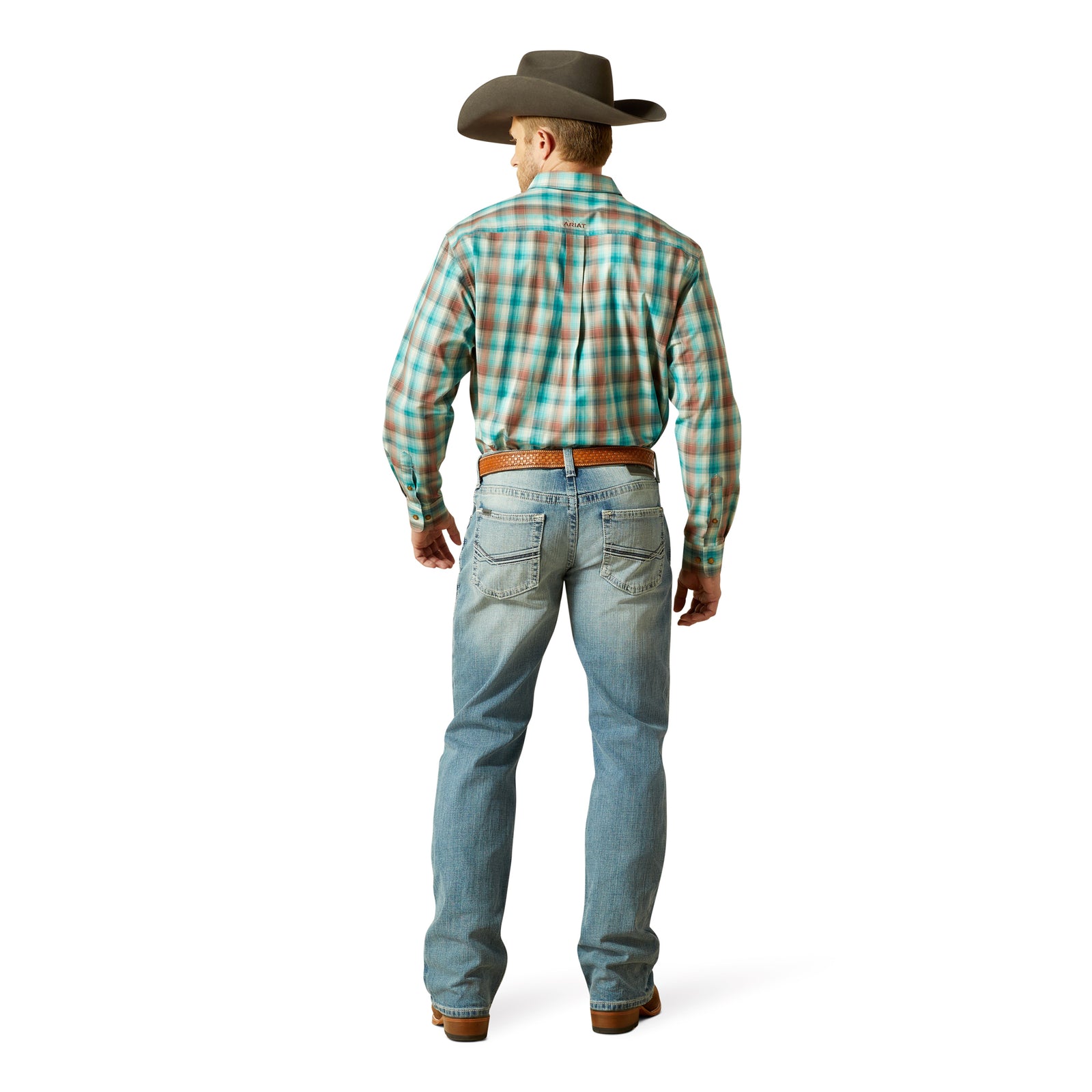 Ariat Men's M4 Thomas Relaxed Boot Cut Jean. Man wearing a plaid shirt and jeans with a cowboy hat on a white background