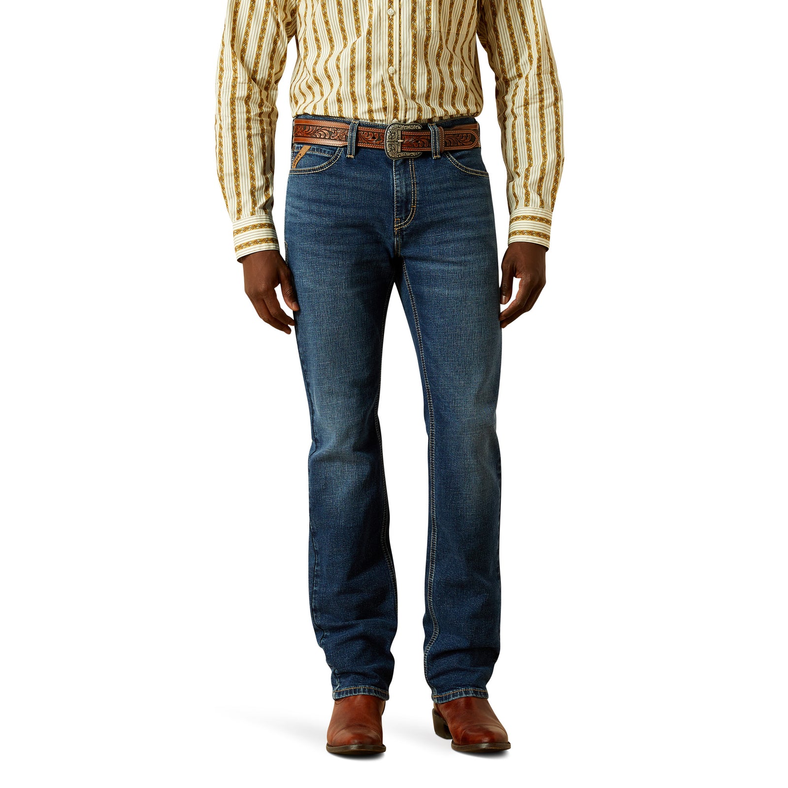 Ariat Men's Samuel M8 Straight Leg Jean. Person wearing a striped shirt, blue jeans, and brown shoes on a white background.
