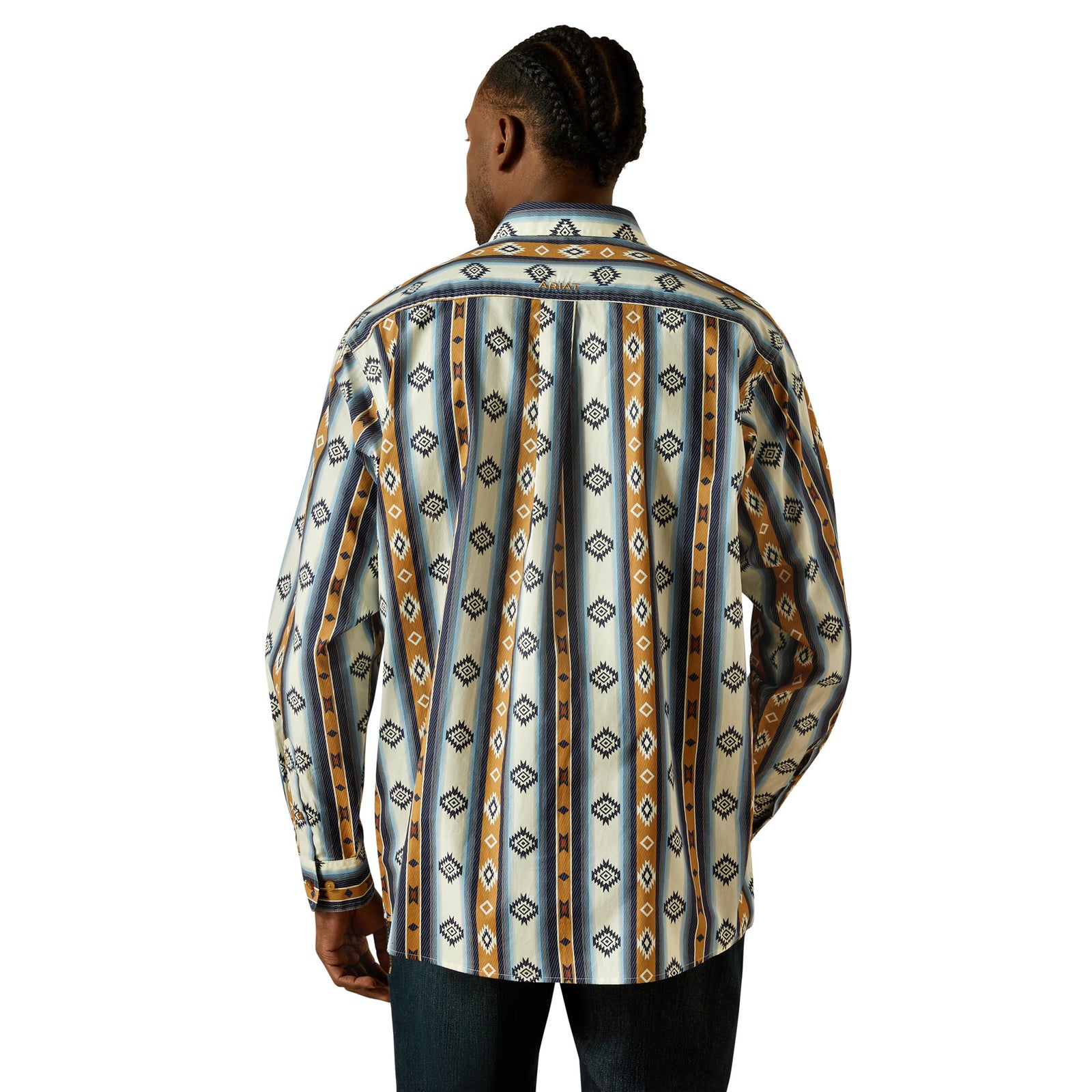 Person wearing a patterned shirt on a white background