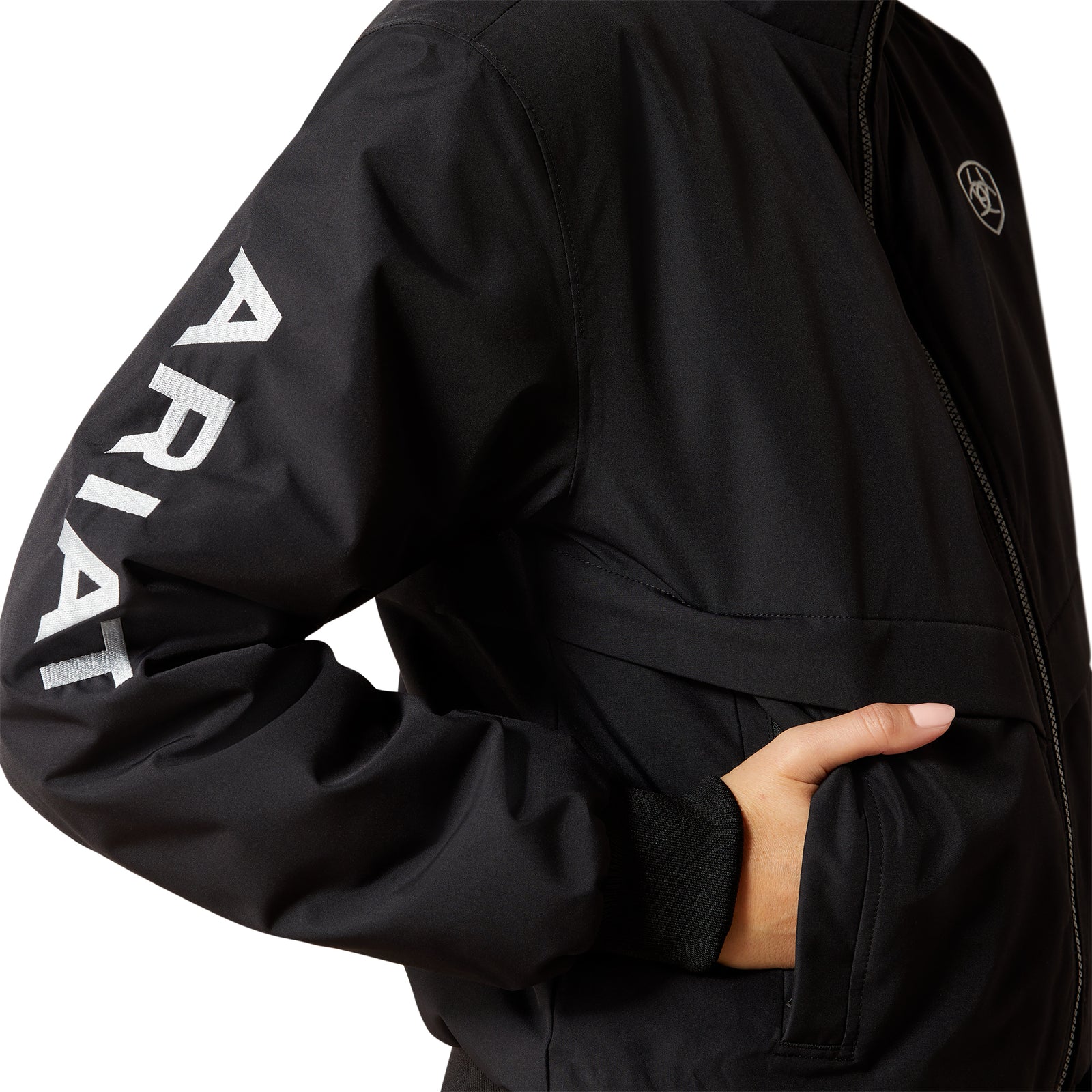 Black jacket with 'Ariat' branding on sleeve against a white background