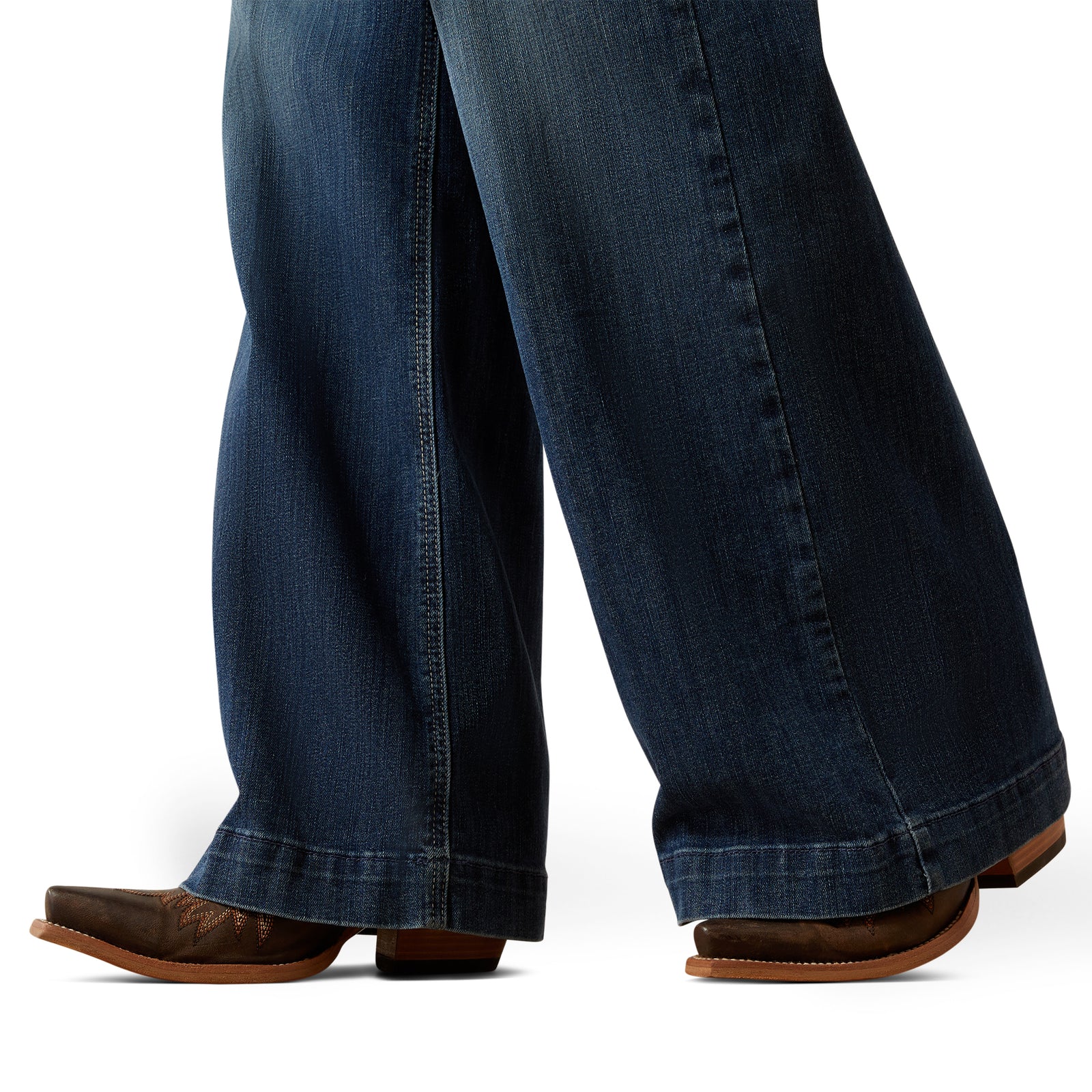 Ariat Women's Rosalie Ultra High Rise Wide Leg Jean. Blue jeans worn with brown boots on a white background