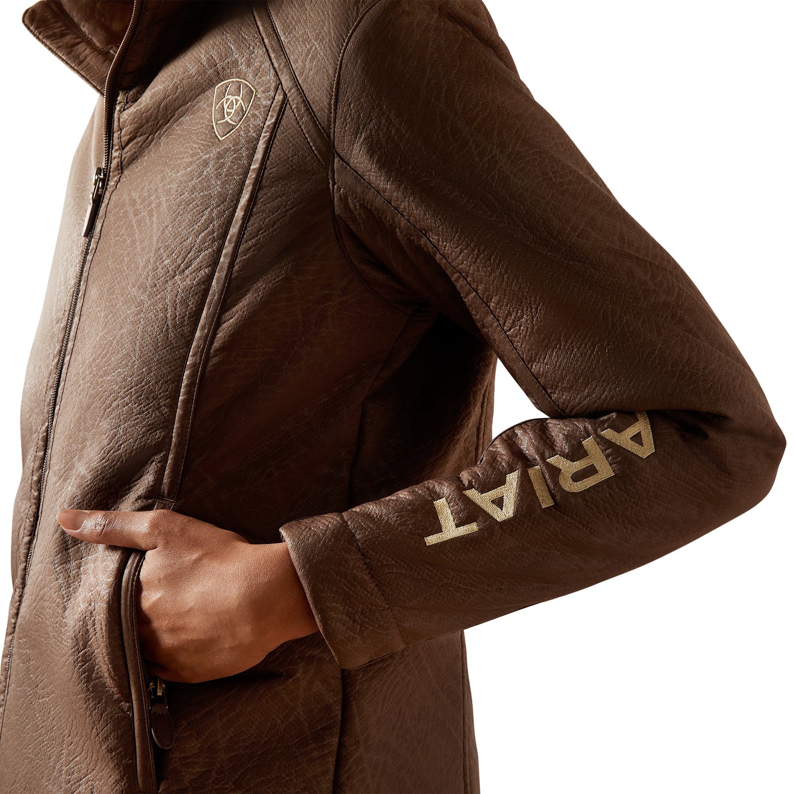 Brown Ariat jacket with logo on sleeve against a white background