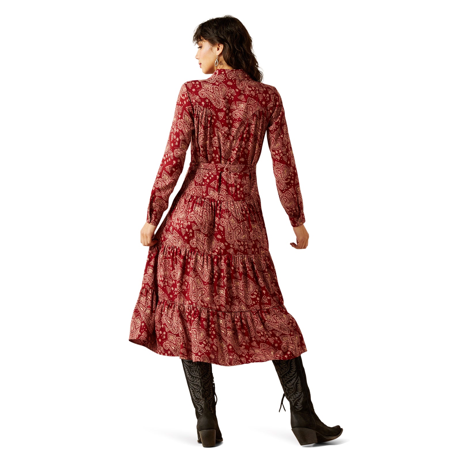 Woman wearing a red floral dress on a white background