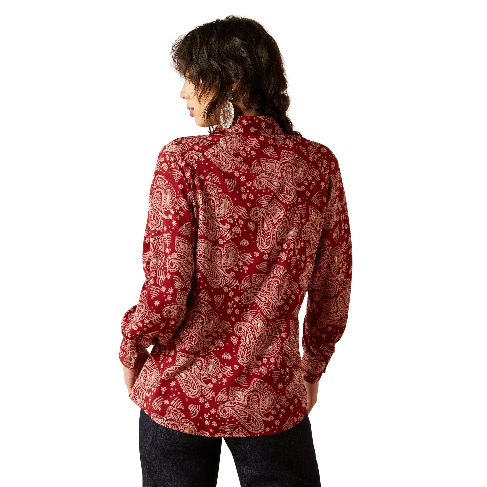 Woman wearing a red patterned shirt on a white background