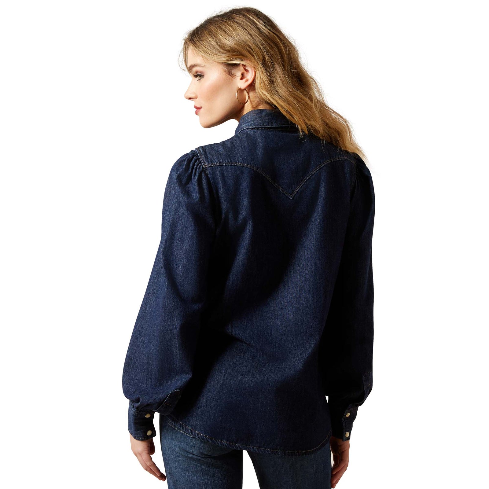 Woman wearing a dark blue denim shirt on a white background