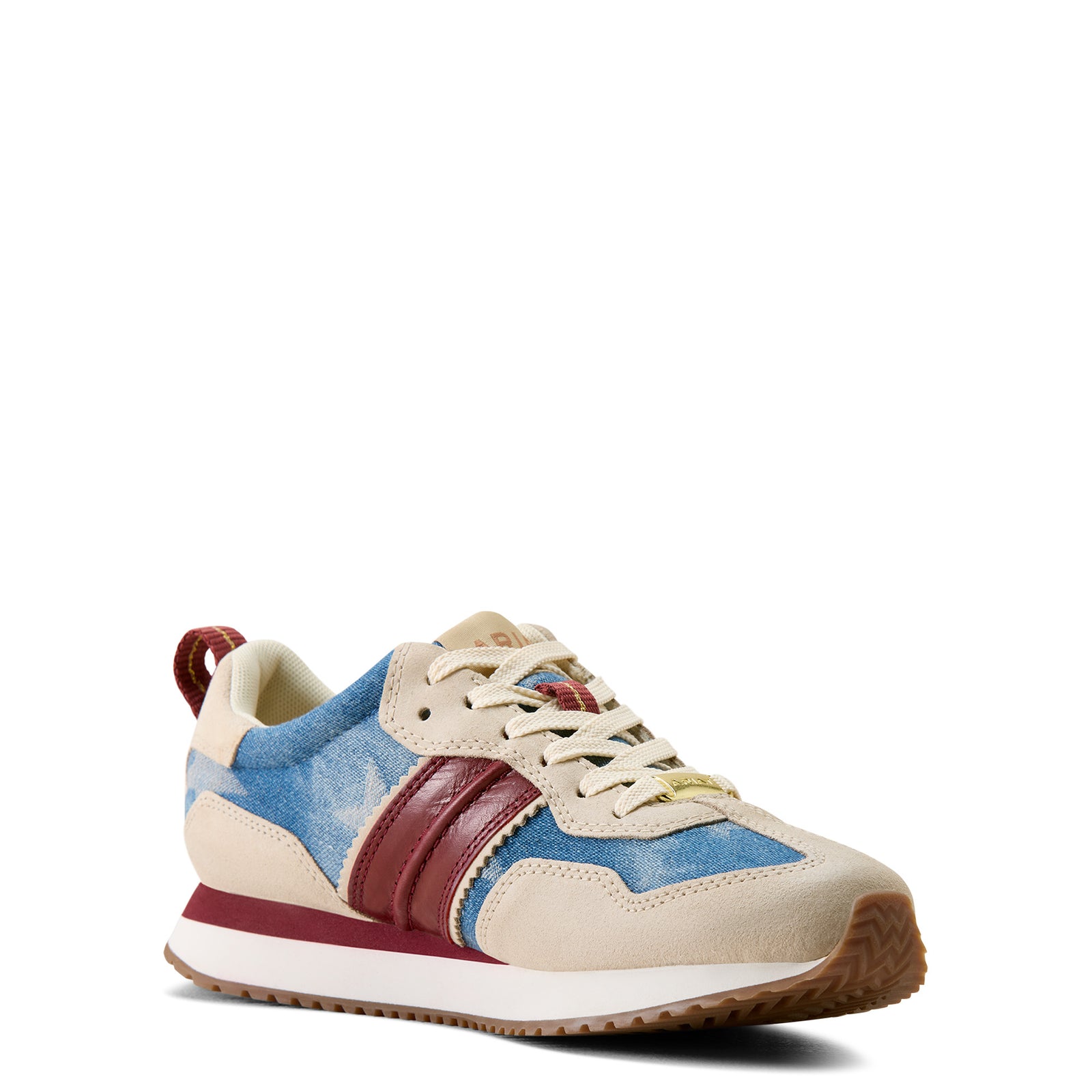 Multicolored sneaker with blue, red, and beige tones on a white background
