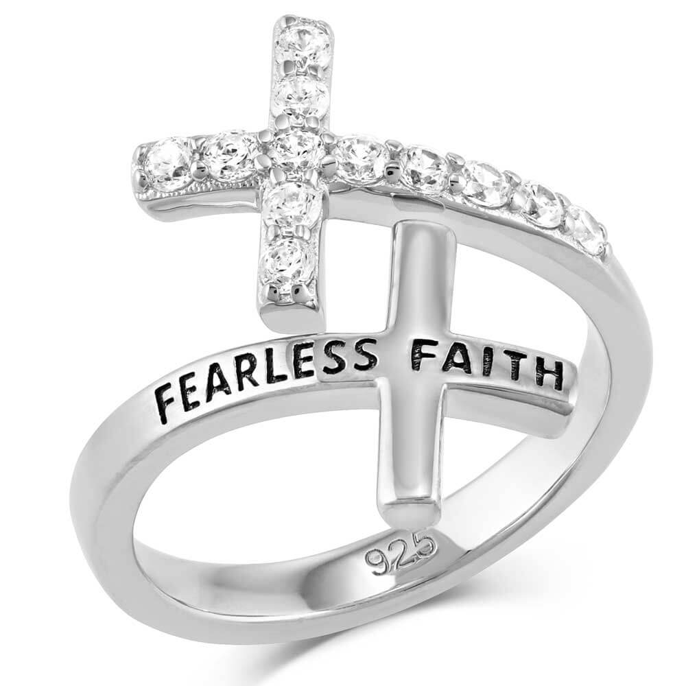 Montana Silversmiths Fearless Faith Crystal Cross Ring. A silver-colored cross ring with cubic zirconia crystals and the inscription 'FEARLESS FAITH' on it.