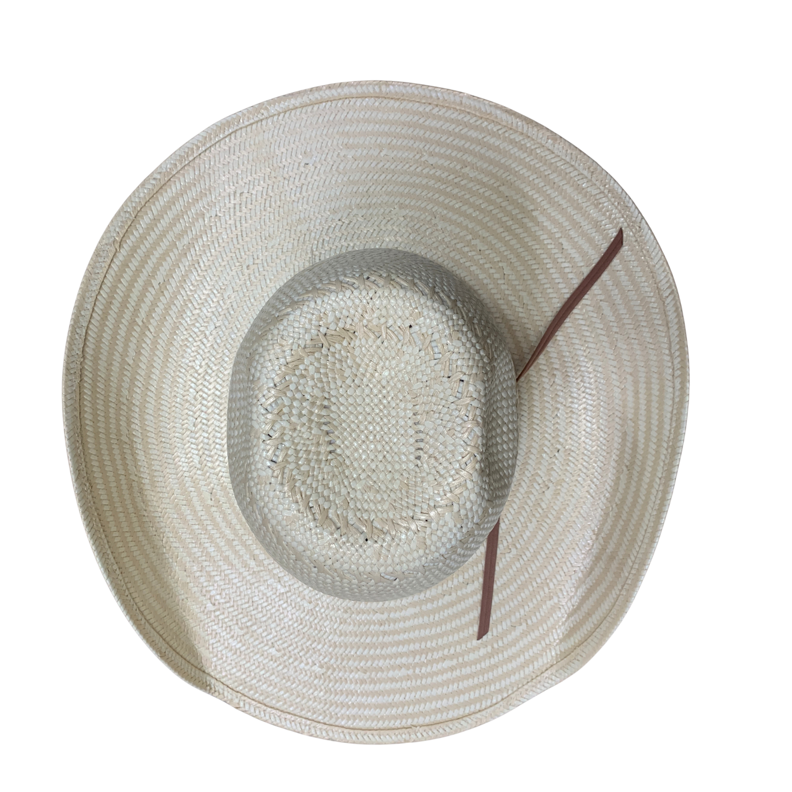 A top-down view of a large, wide-brimmed straw hat in a light beige color, featuring a brown decorative ribbon tied on the side, set against a plain white background.