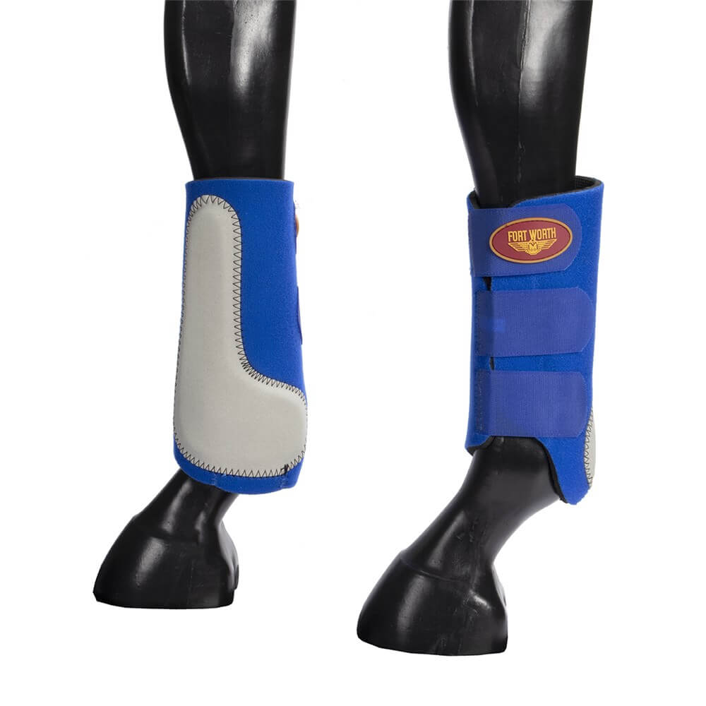 Fort Worth Easy Fit Splint Boots. A pair of blue Fort Worth splint boots on a horse's front legs, featuring Velcro straps and an extended leather patch.
