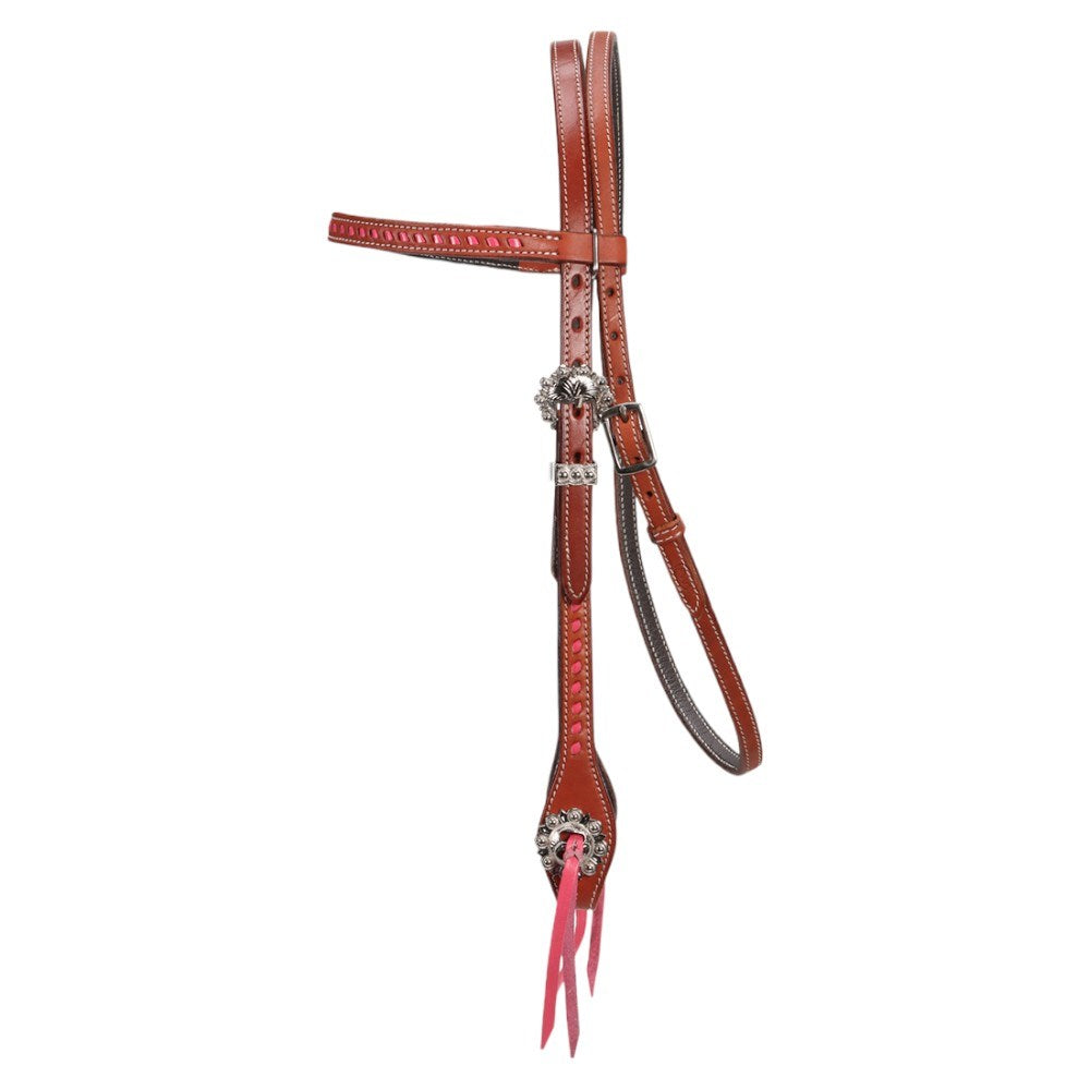 A brown leather horse bridle with silver concho hardware and bright pink leather hanging tassels, displayed on a solid white background.