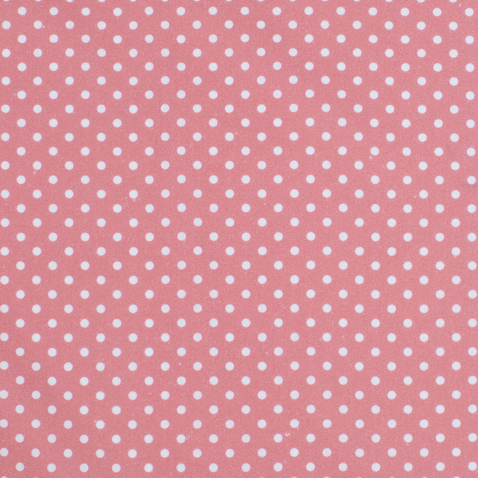 Pink fabric with white polka dots