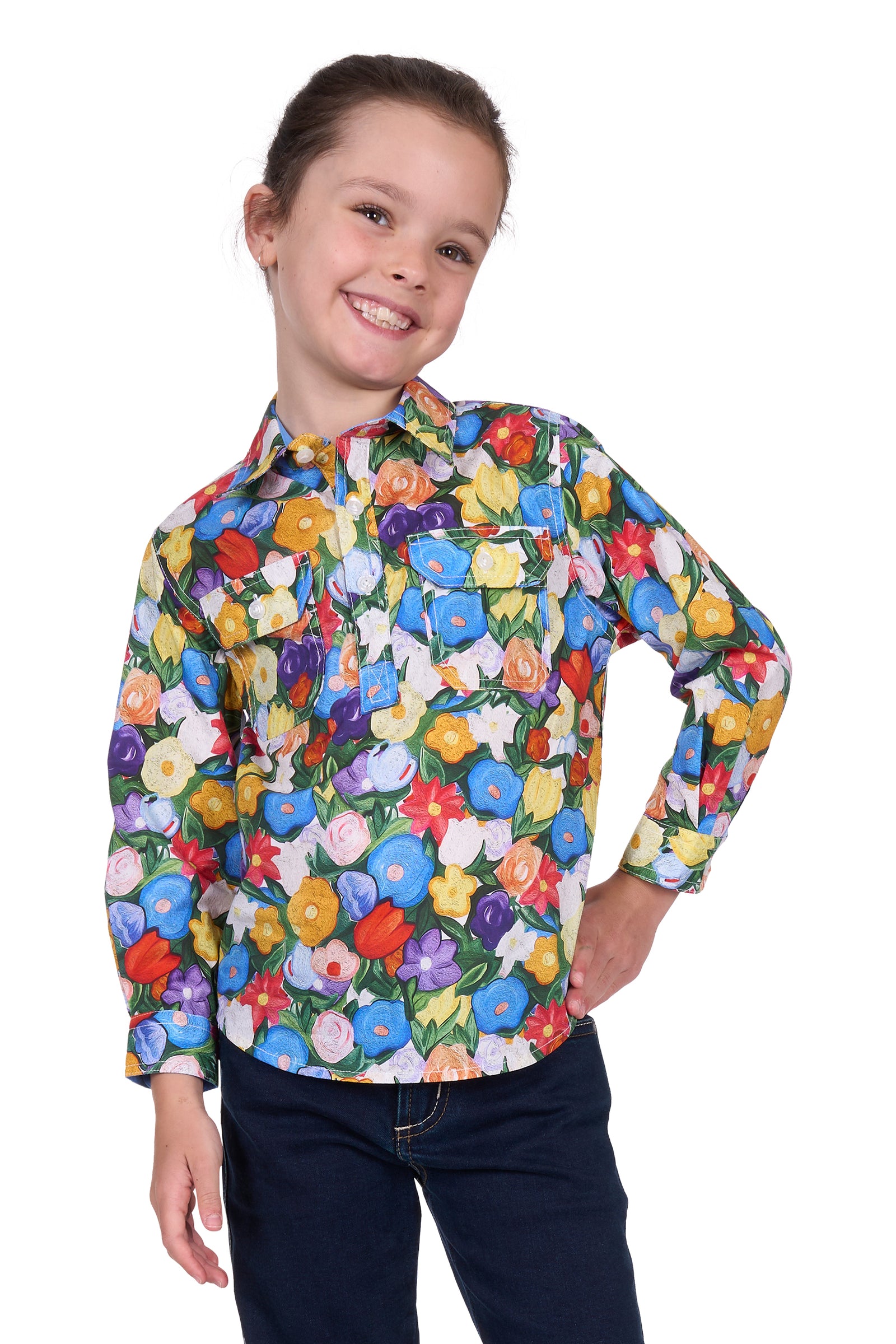 Hard Slog Girl's Delia 1/2 Placket L/S Shirt. Child wearing a colorful floral shirt on a white background