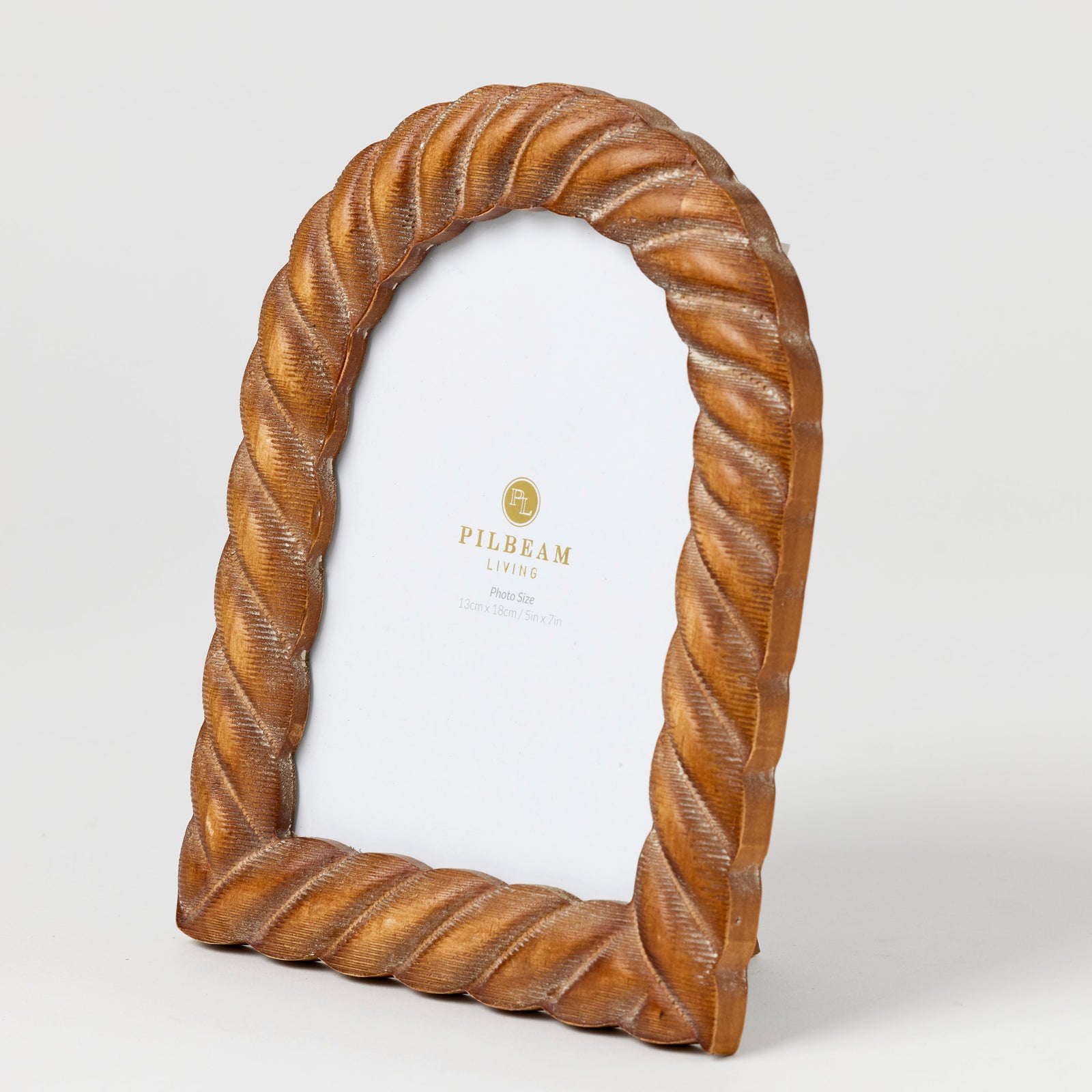 Trentham Arch 5 x 7 Photo Frame. Wooden decorative item with a twisted design on a white background