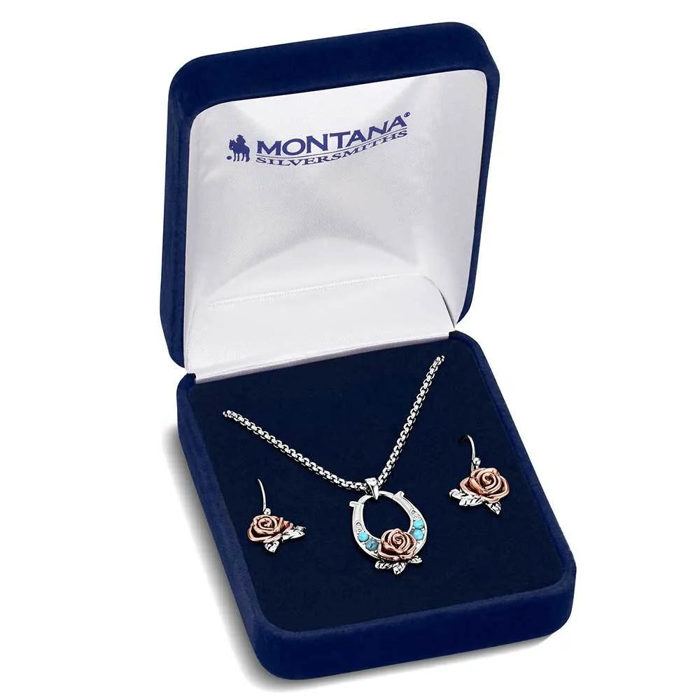 Jewelry set in a Montana Silversmiths box on a white background
