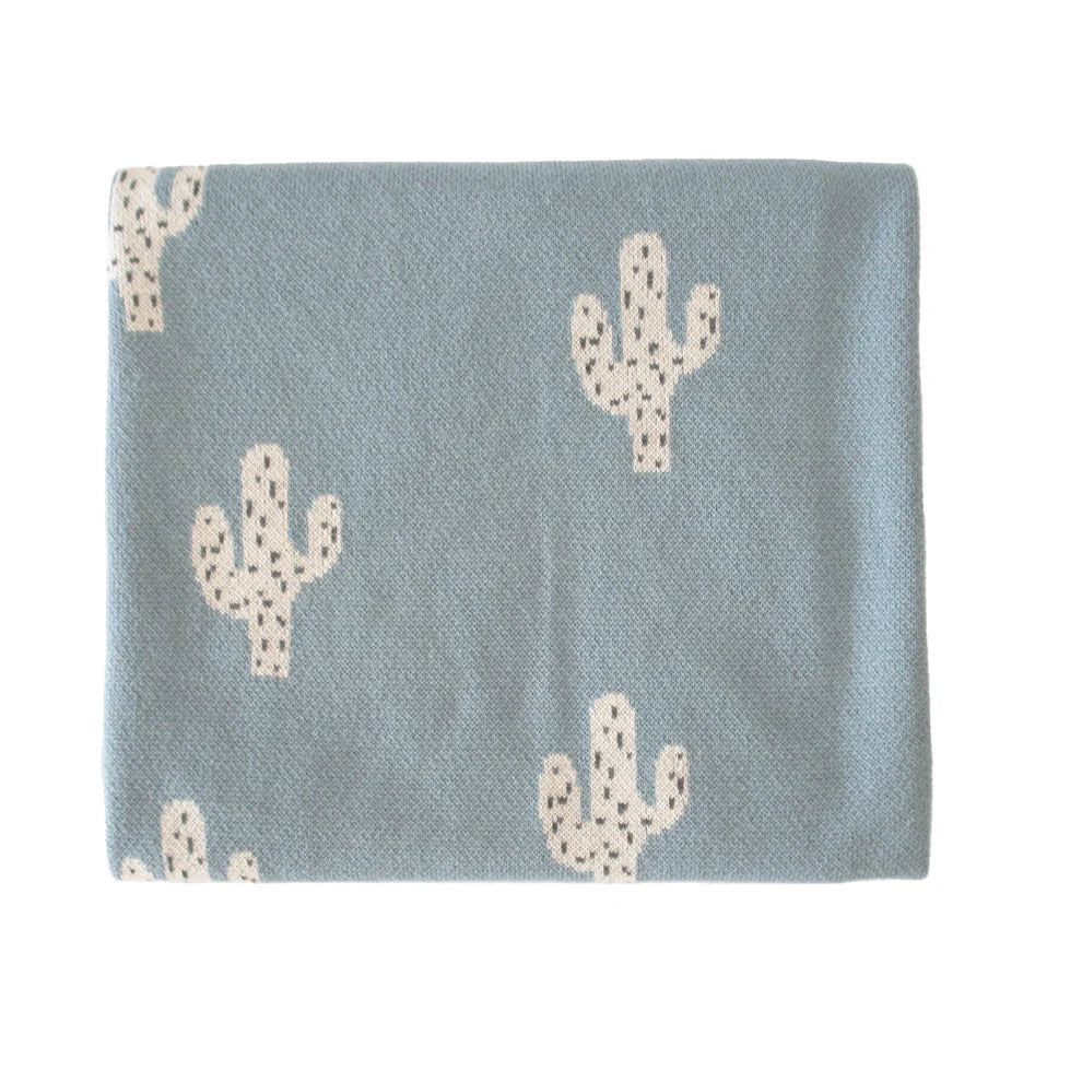 Alimrose Cactus Baby Blanket Blue. Light blue blanket with cactus patterns on a white background
