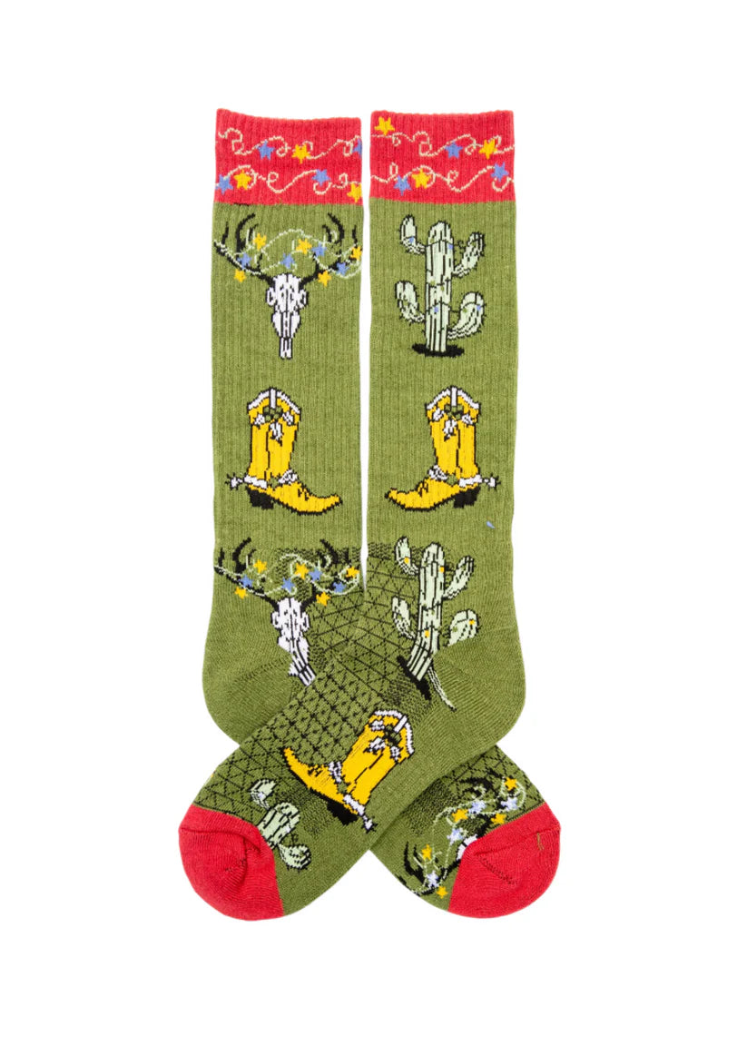 Lucky Chuck Get a Little Western Performance SocksGreen socks with cowboy and desert-themed designs on a white background