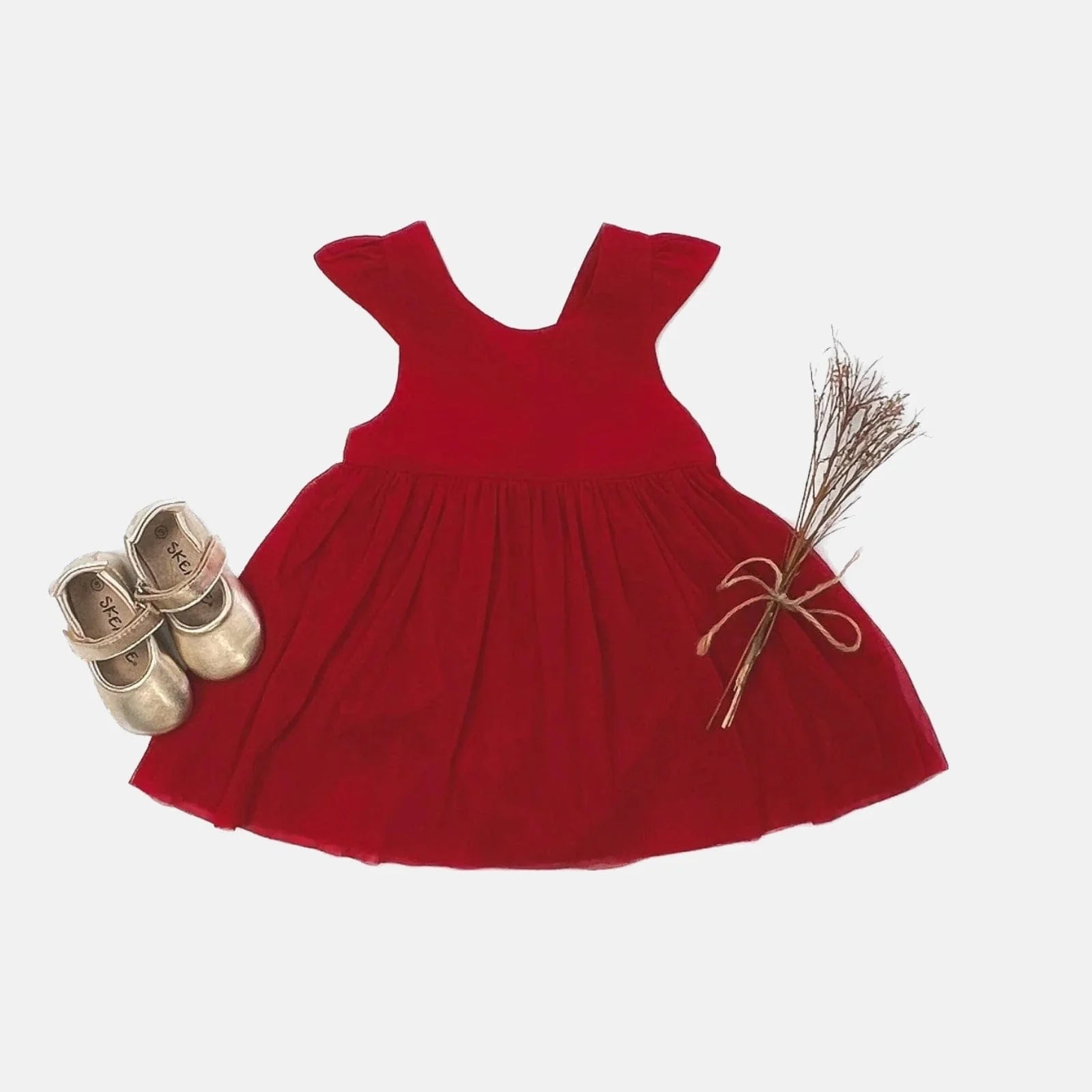 Love Henry Infant Girl's Lottie Dress. A red infant girl's dress with a pleated waist and sleeveless design, accompanied by a pair of shoes and a small decorative bow.
