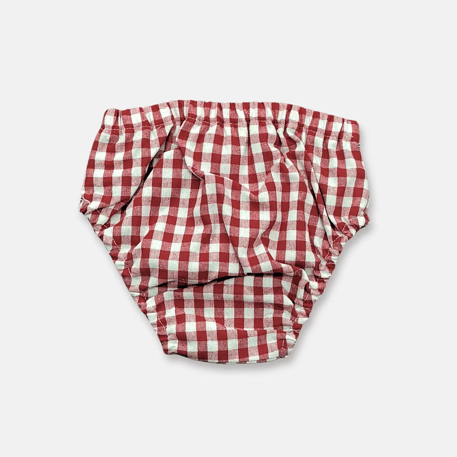 Love Henry Infant Girl's Pilcher. Red and white checkered baby girl's diaper cover with a elastic waistband and decorative white tie.