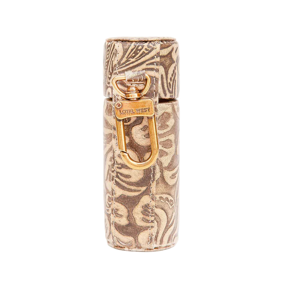 Decorative cylindrical container with gold lock and intricate design on a white background