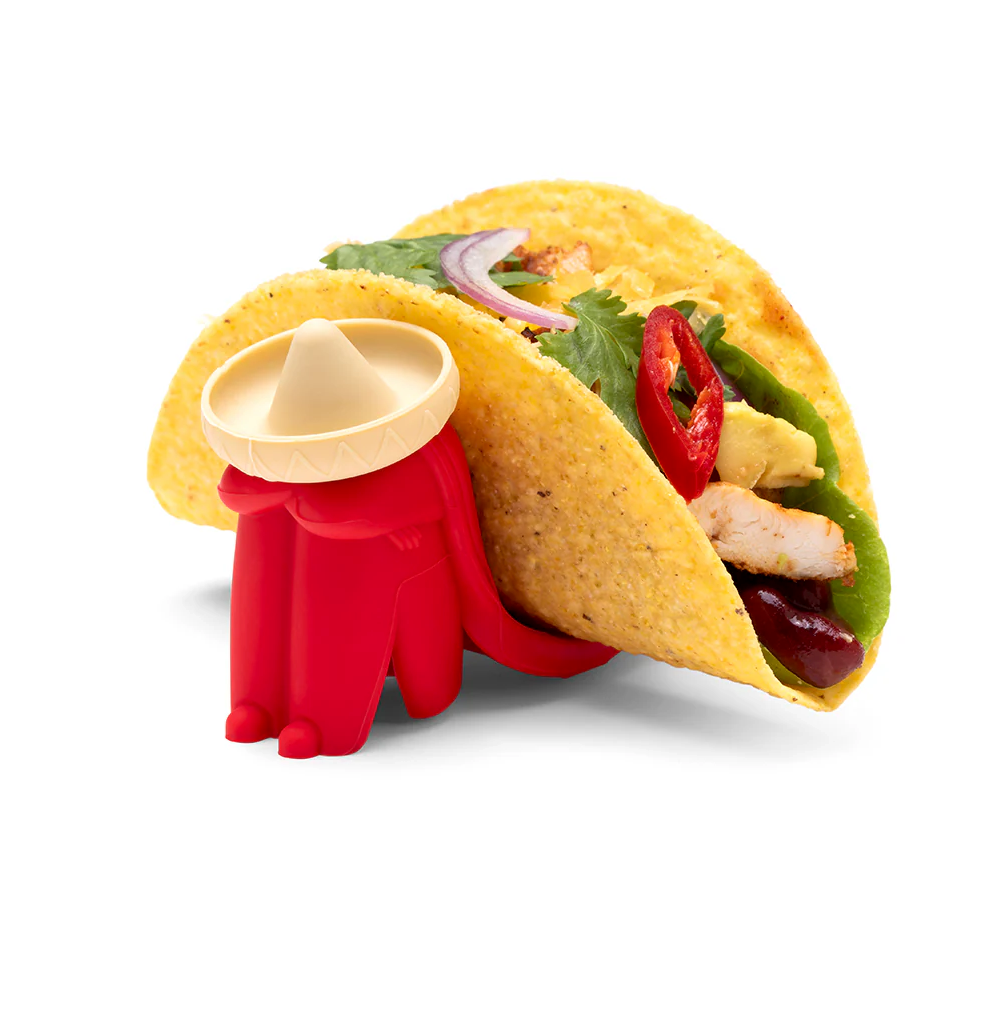 Monkey Business Los Dos Taco Holders. Taco-shaped holder with a toy figure inside on a white background