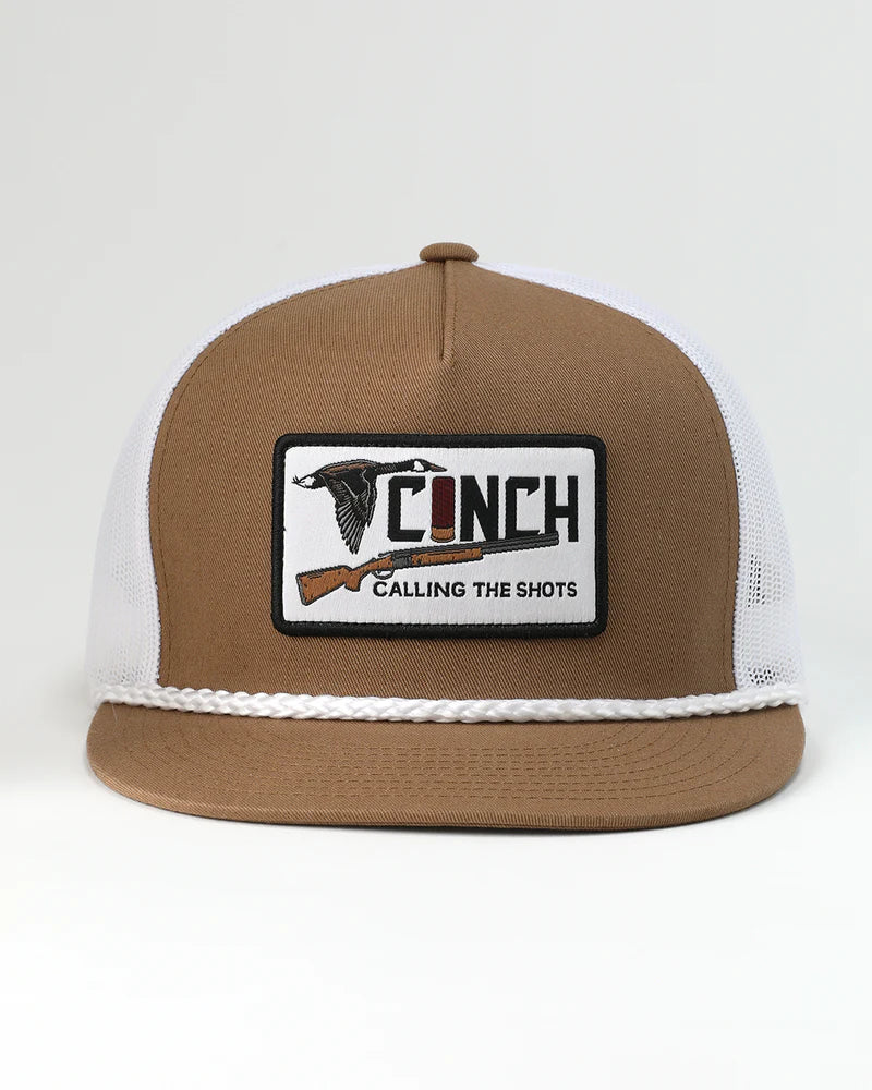 Brown and white cap with a patch on a light gray background