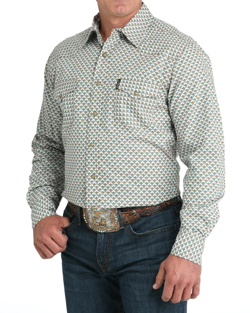 Cinch Men's Modern Fit Snap Front Western Shirt. Man wearing a patterned long-sleeve shirt and jeans on a white background