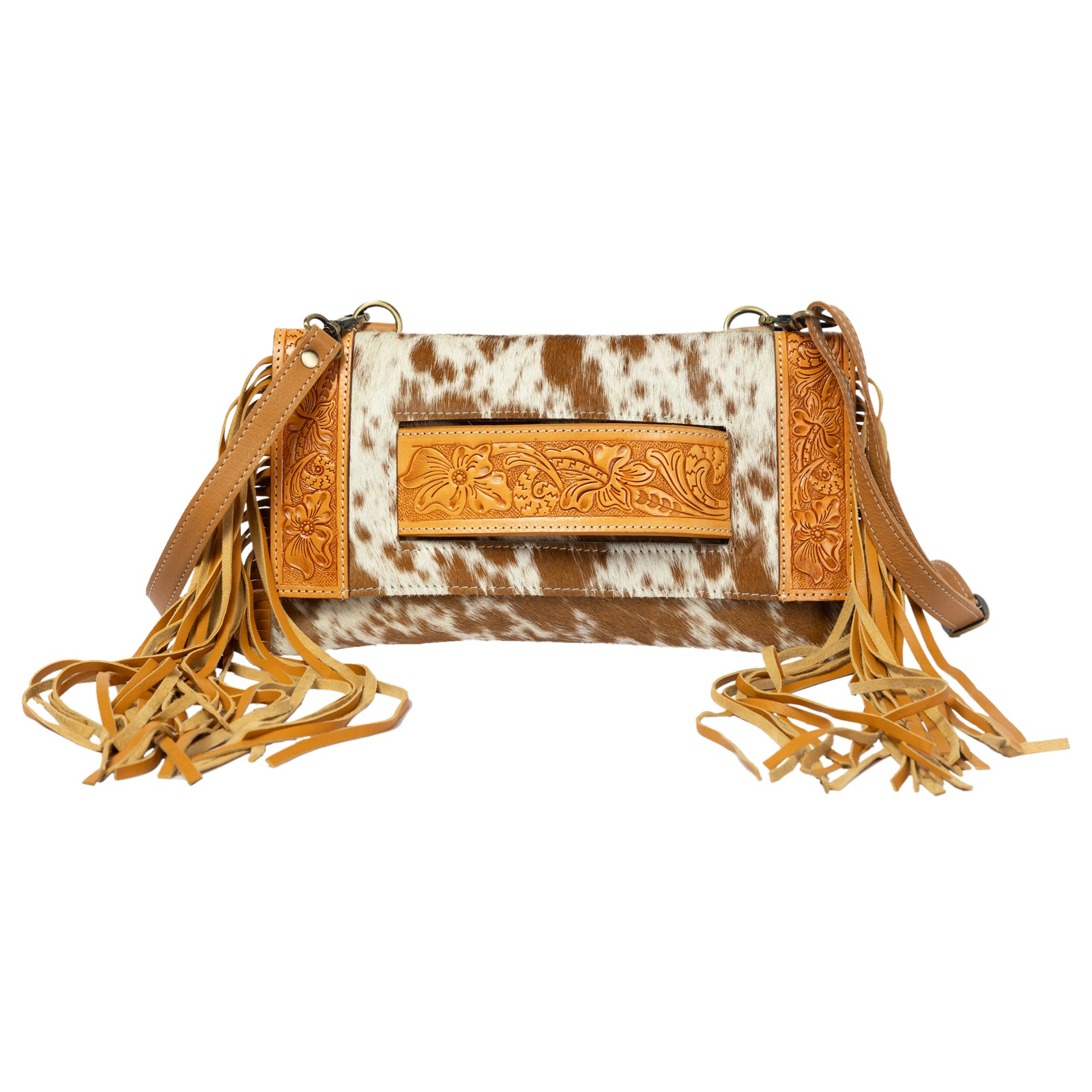 Handbag with cow print and brown leather accents on a white background