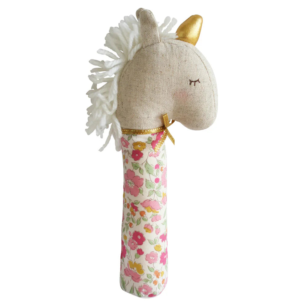 Alimrose Yvette Unicorn Squeaker Rose Garden. Unicorn-shaped toy with floral handle on a white background