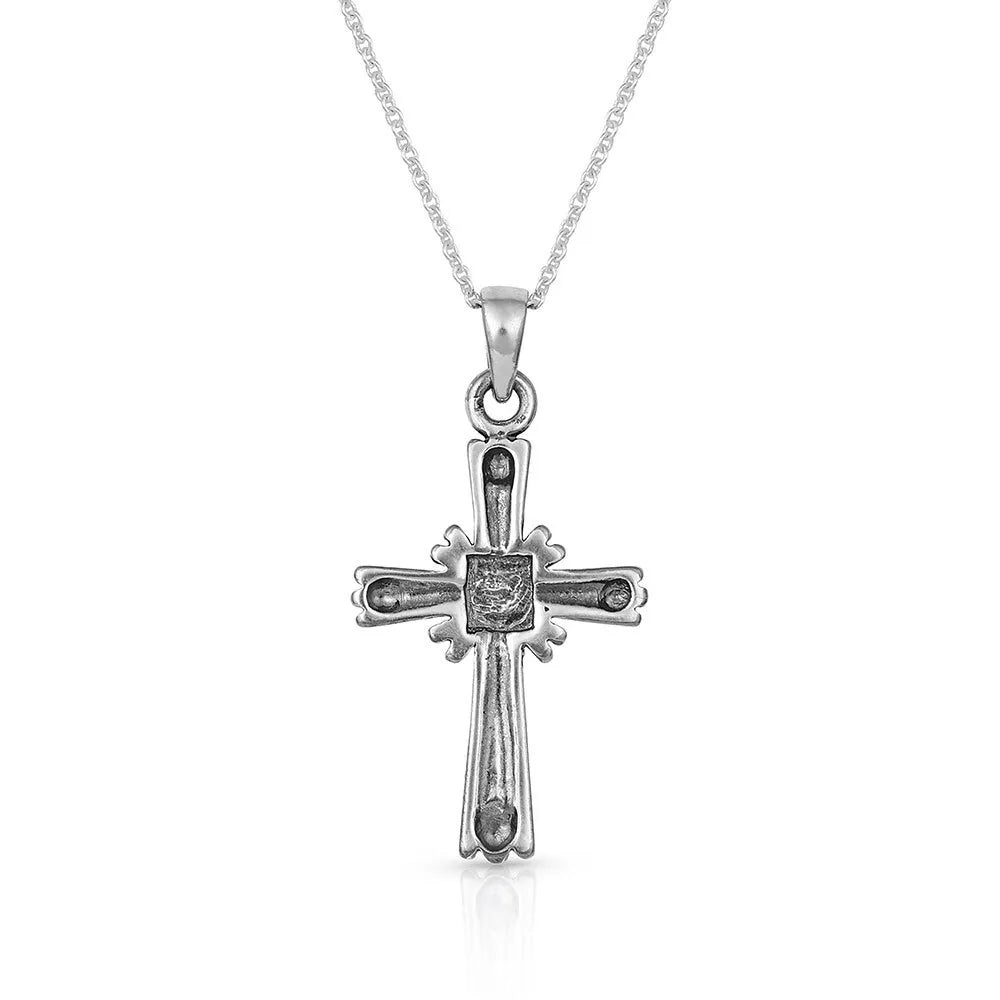 Montana Silversmiths Faith Beaming Cross Necklace. Silver cross pendant necklace on a white background