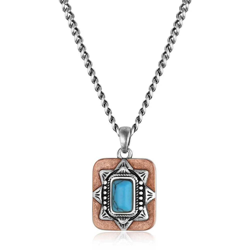 Necklace with a square pendant featuring a blue stone on a white background