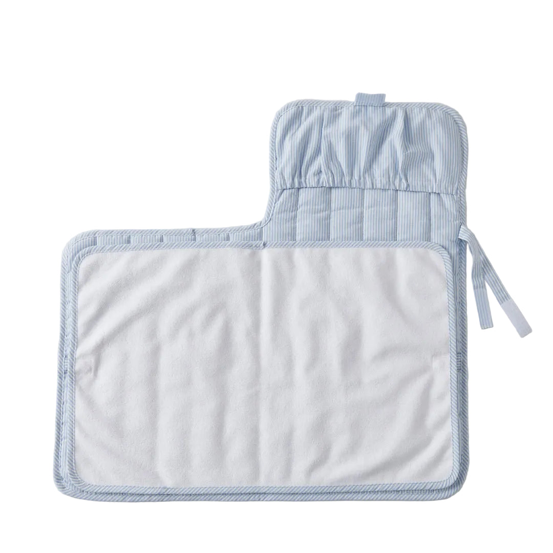 Set of blue and white checkered pot holder and trivet on a light gray background