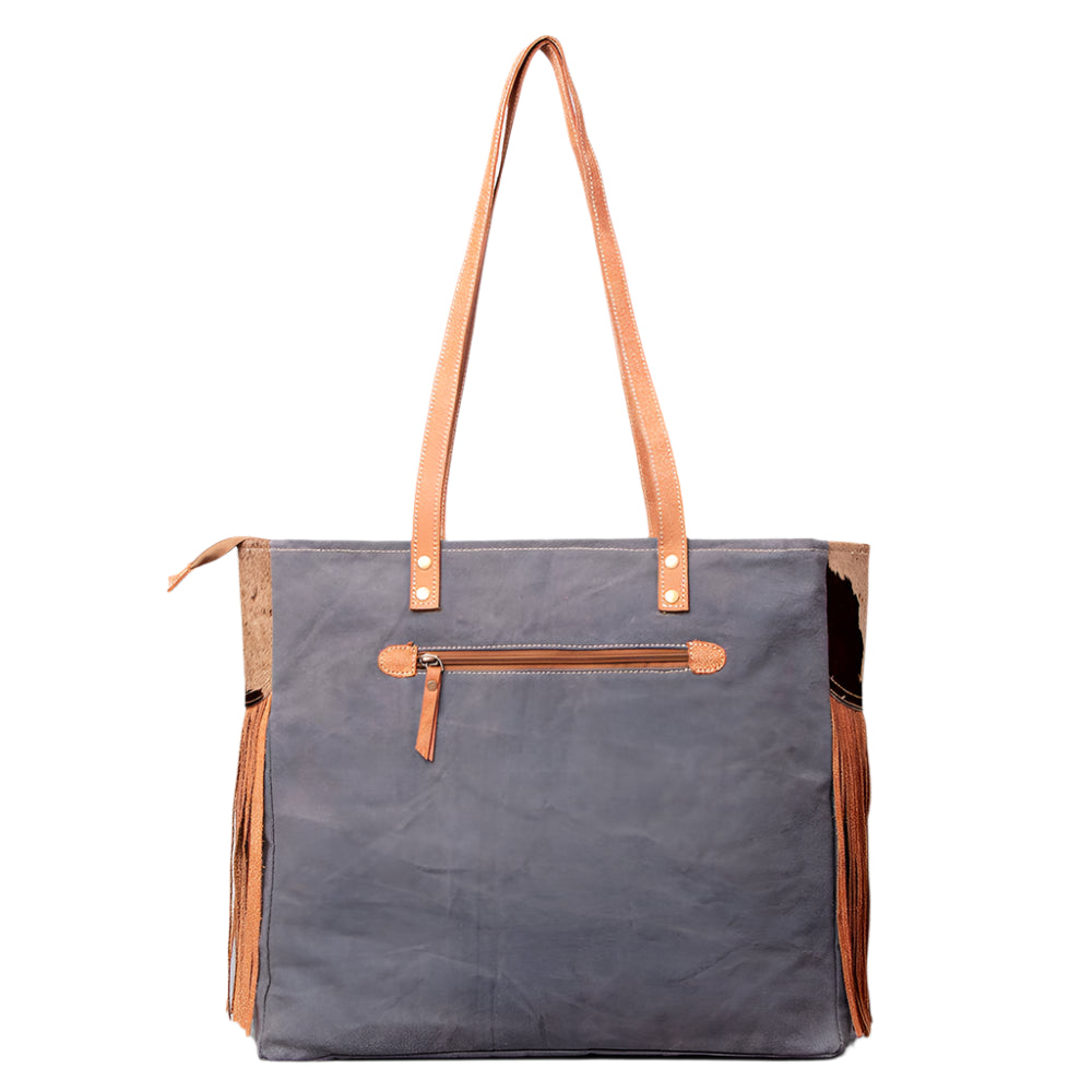 American Darling canvas and leather weekend bag with zippered pocket and leather strap on a white background