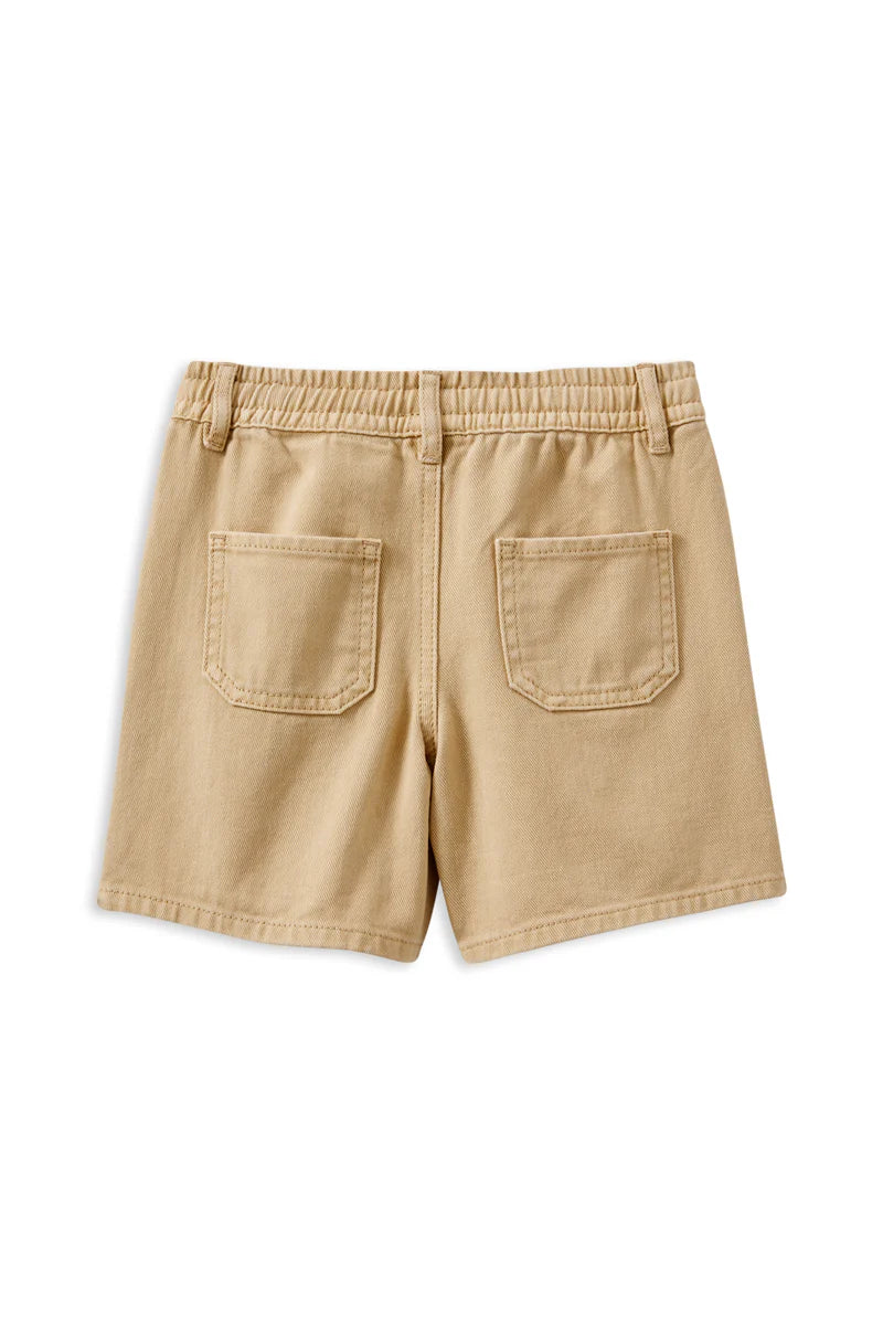 Milky Biscuit Short. Beige shorts with two front pockets on a white background