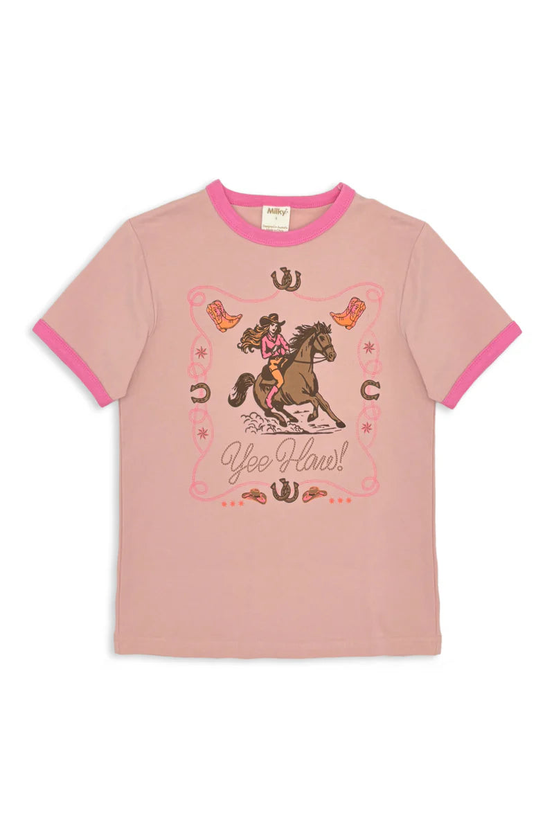 Milky Yee Haw Tee. Pink t-shirt with horse and cowgirl graphic on a white background