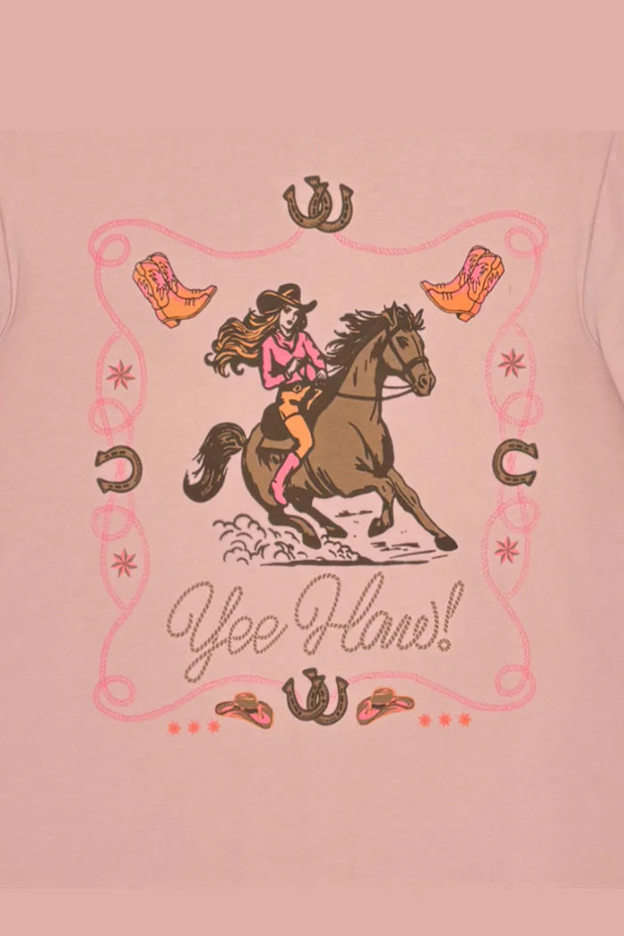 Milky Yee Haw Tee. Pink t-shirt with a graphic of a cowgirl riding a horse and 'Yee Haw!' text on a pink background.