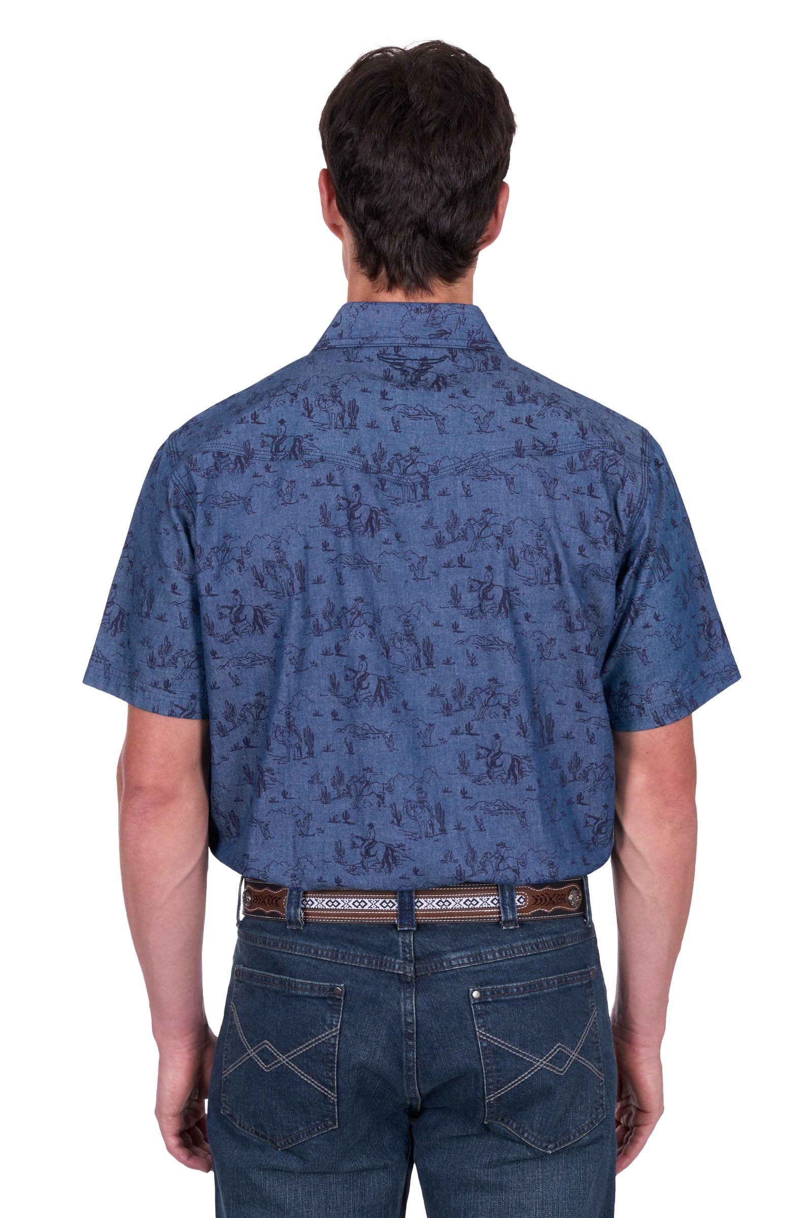Pure Western Men's Travis S/S Western Shirt. Man wearing a blue patterned shirt and jeans on a white background
