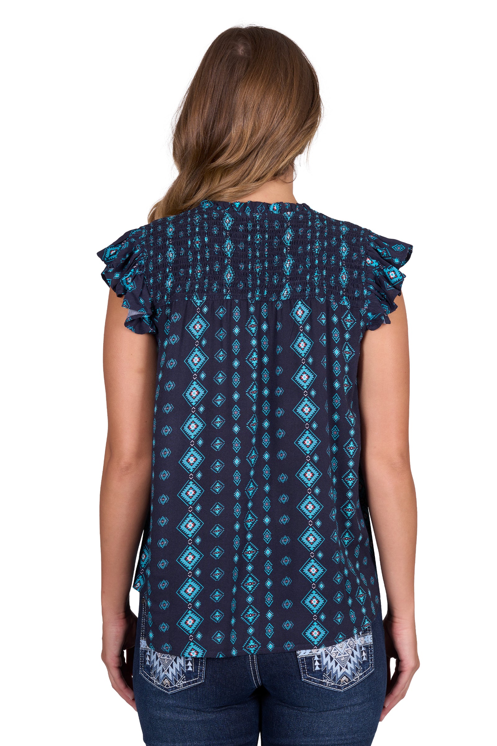 Pure Western Women's Estella Blouse. Woman wearing a blue patterned top with ruffled sleeves on a white background