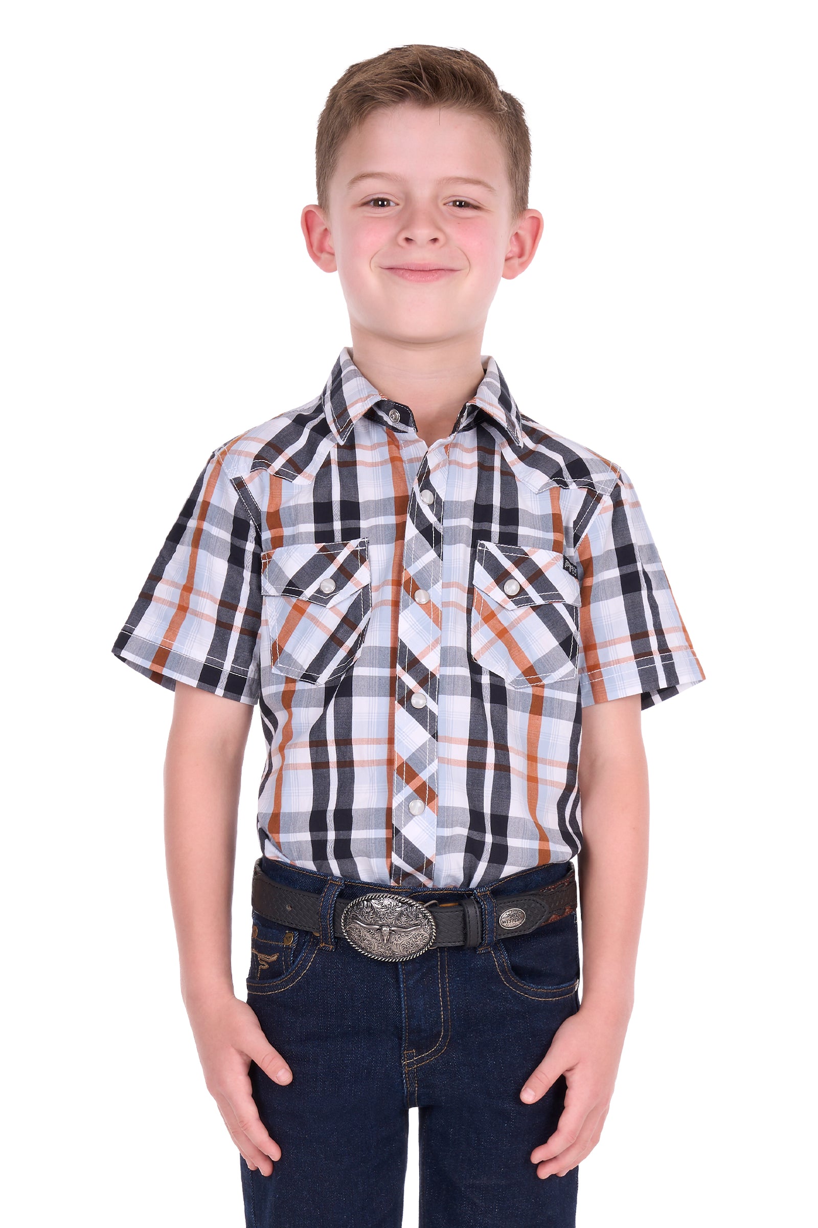 A young boy modeling a short-sleeve western plaid shirt with dark blue jeans and a western belt, shot against a solid white background.
