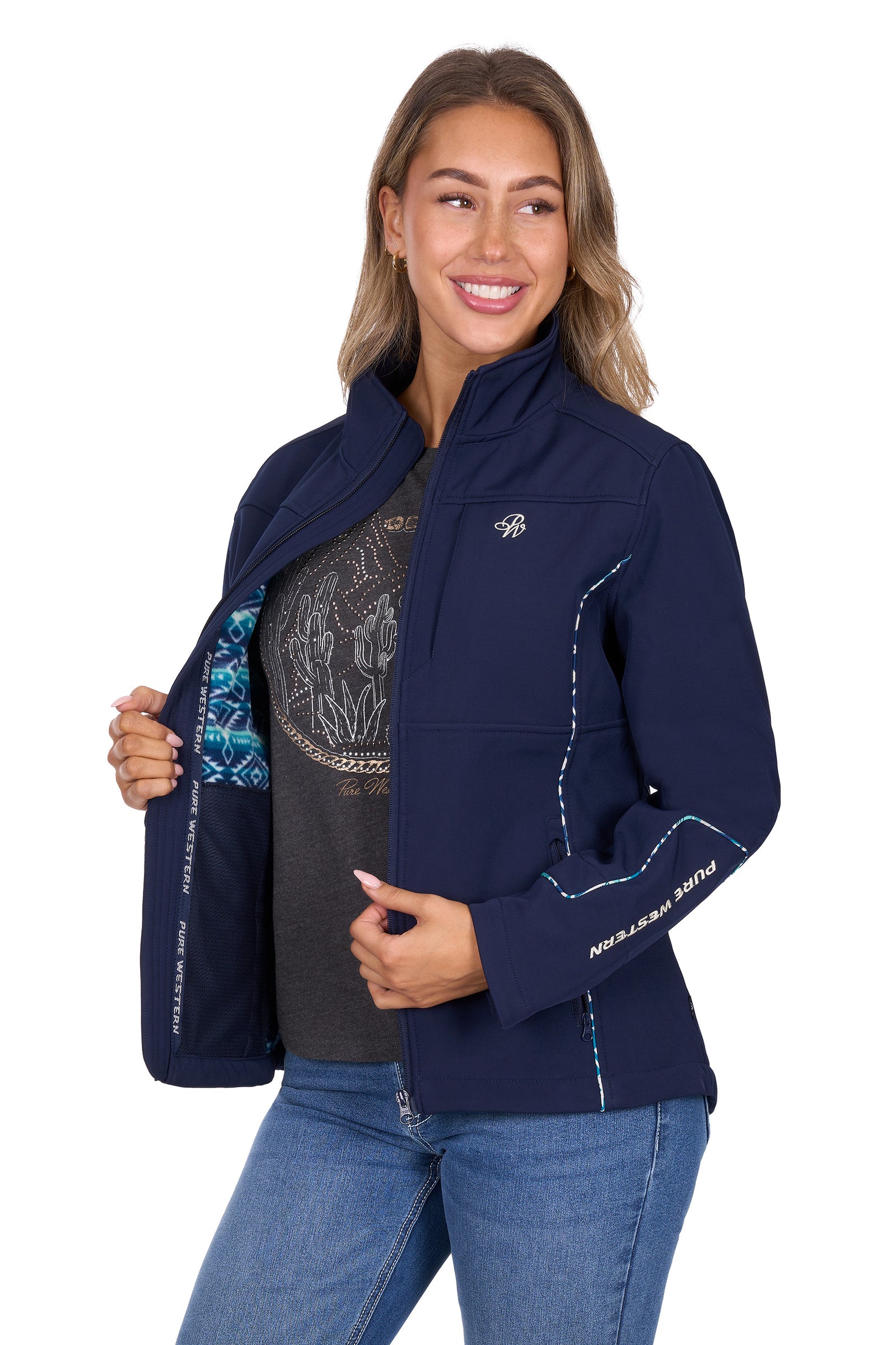 Woman wearing a navy blue jacket with visible branding on a white background